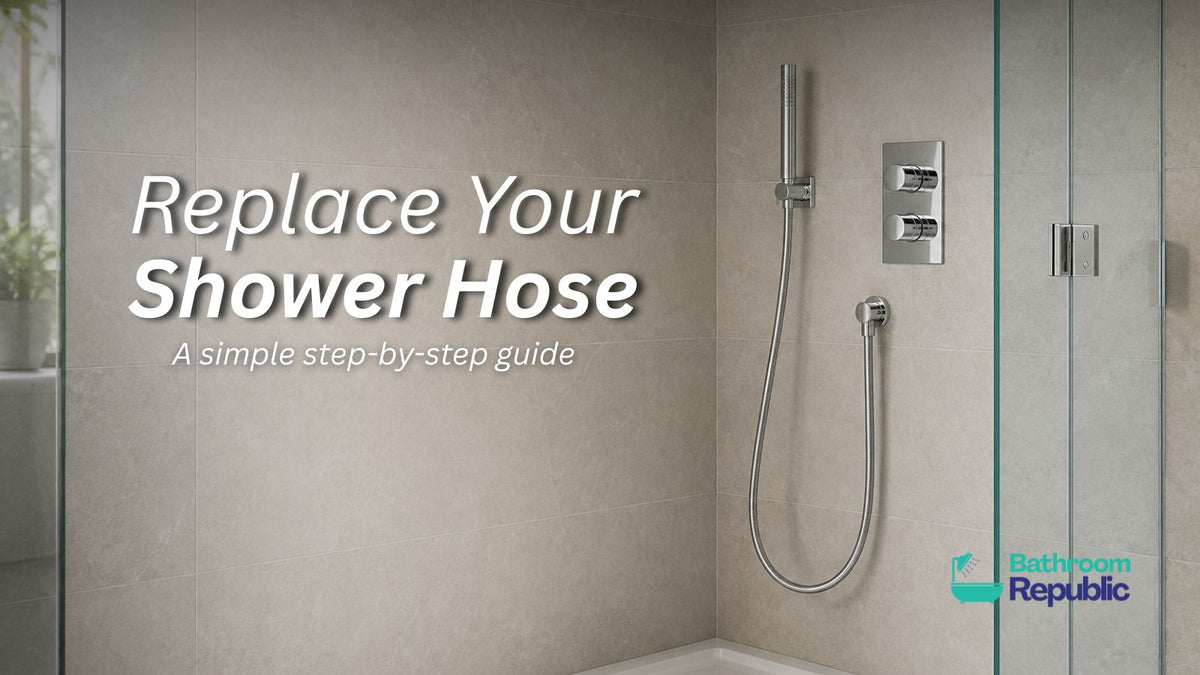 Chrome handheld shower and replacement hose in a modern shower enclosure