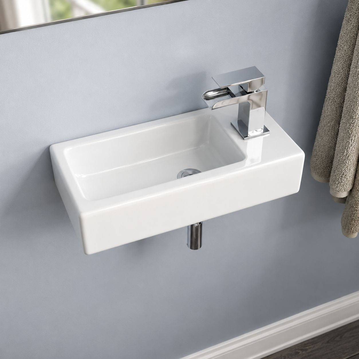 White wall-hung cloakroom basin in a grey tiled bathroom — Bathroom Republic UK