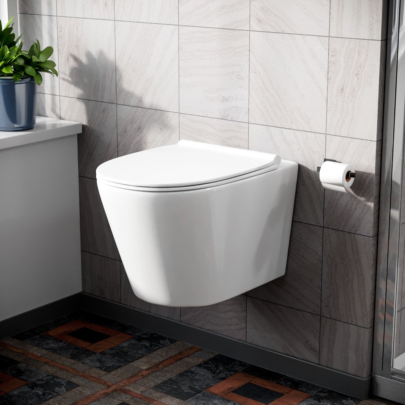 White wall hung toilet pan fixed to concealed in-wall carrier frame against grey panelled bathroom wall — Bathroom Republic UK
