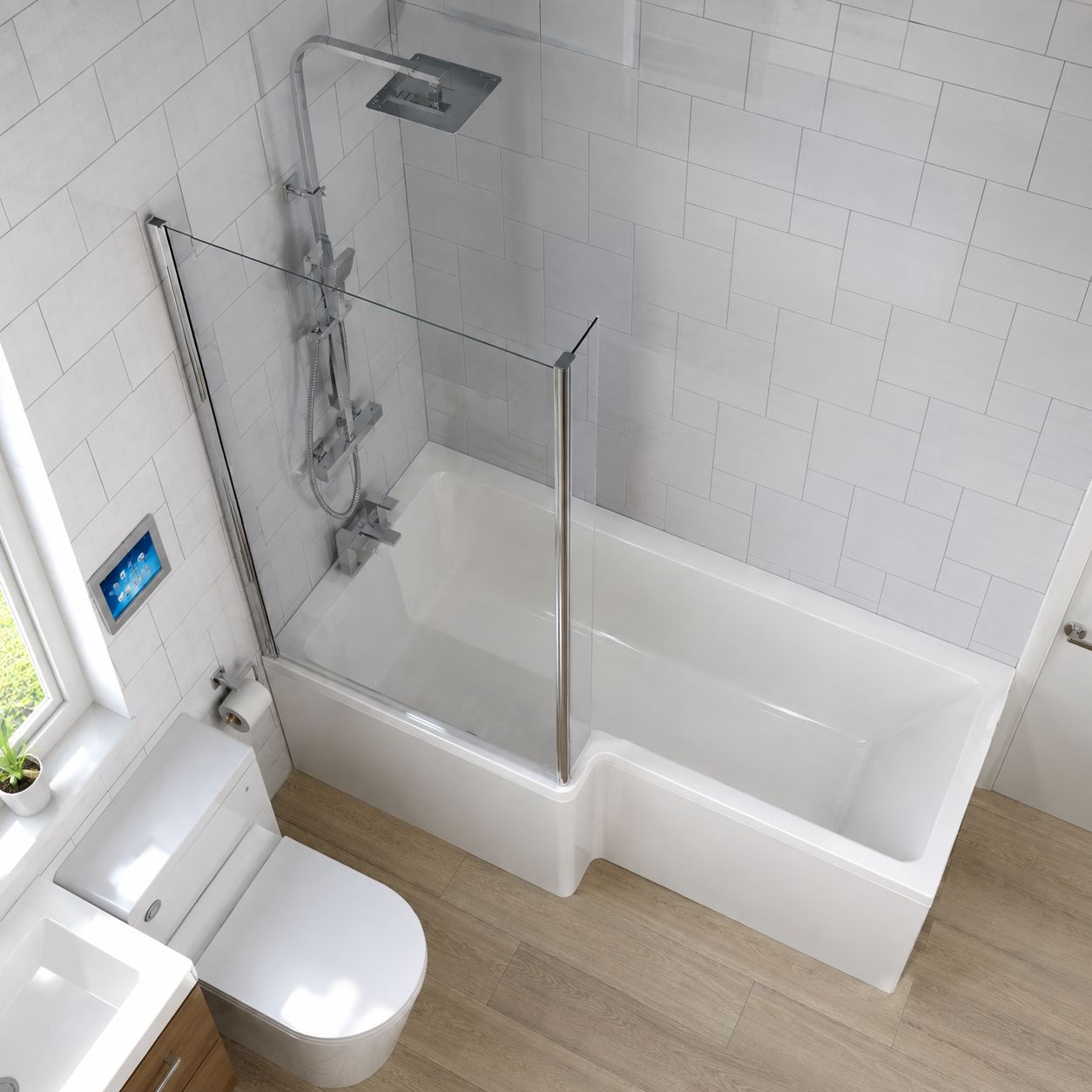 White L-shaped shower bath with glass bath screen in grey-tiled bathroom — Bathroom Republic UK
