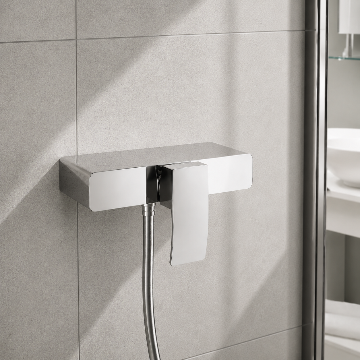 Chrome exposed shower valve with separate hot and cold controls, surface-mounted on white wall tiles — Bathroom Republic UK