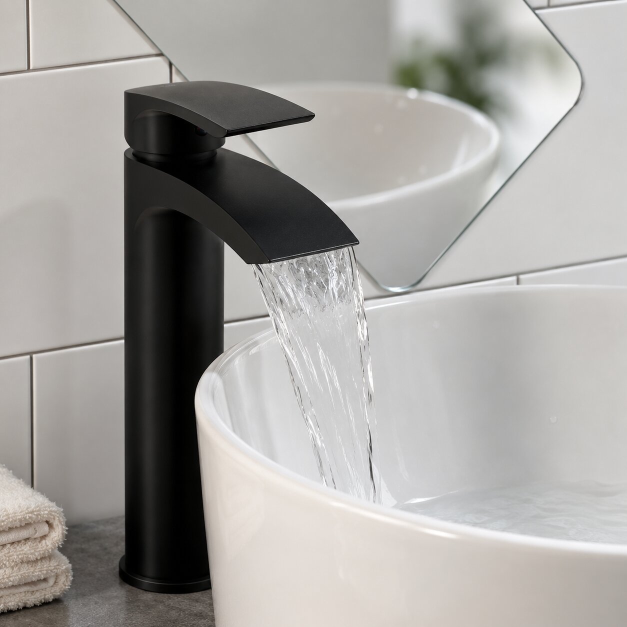 Tall high rise mono basin mixer tap on a countertop basin — Bathroom Republic UK