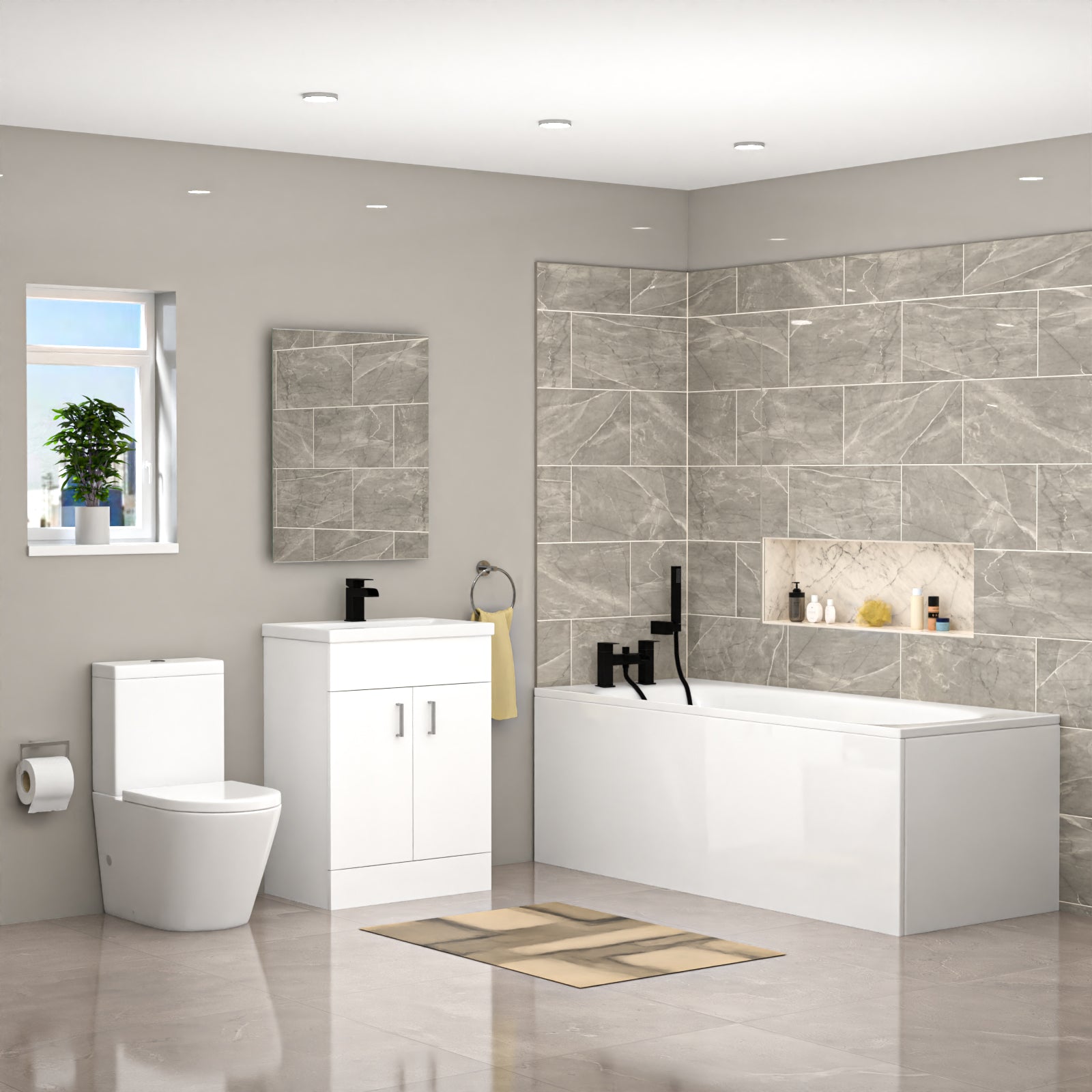 Modern bathroom with white toilet, sink, and bathtub against a gray tiled wall.