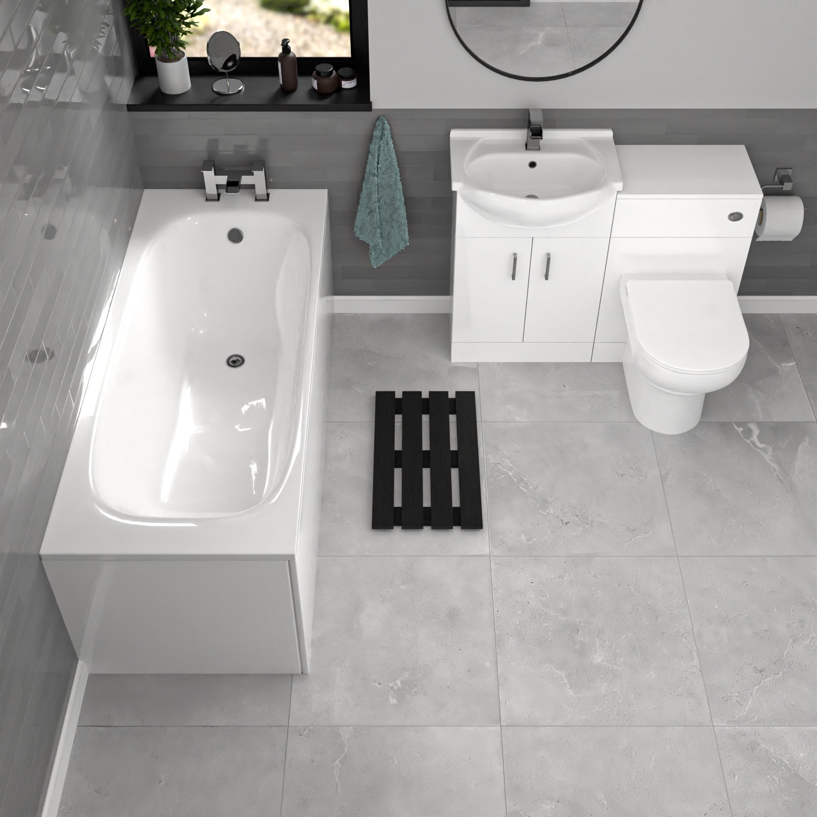 Modern bathroom with white bathtub, sink, and toilet