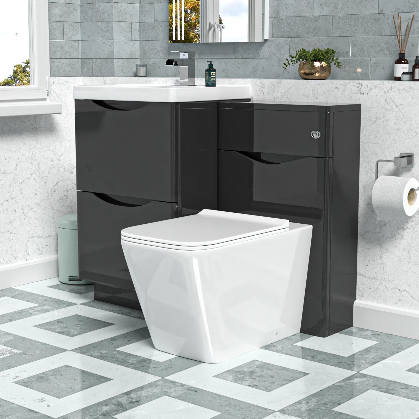 Bathroom setup with black vanity unit, white toilet, and decorative elements.