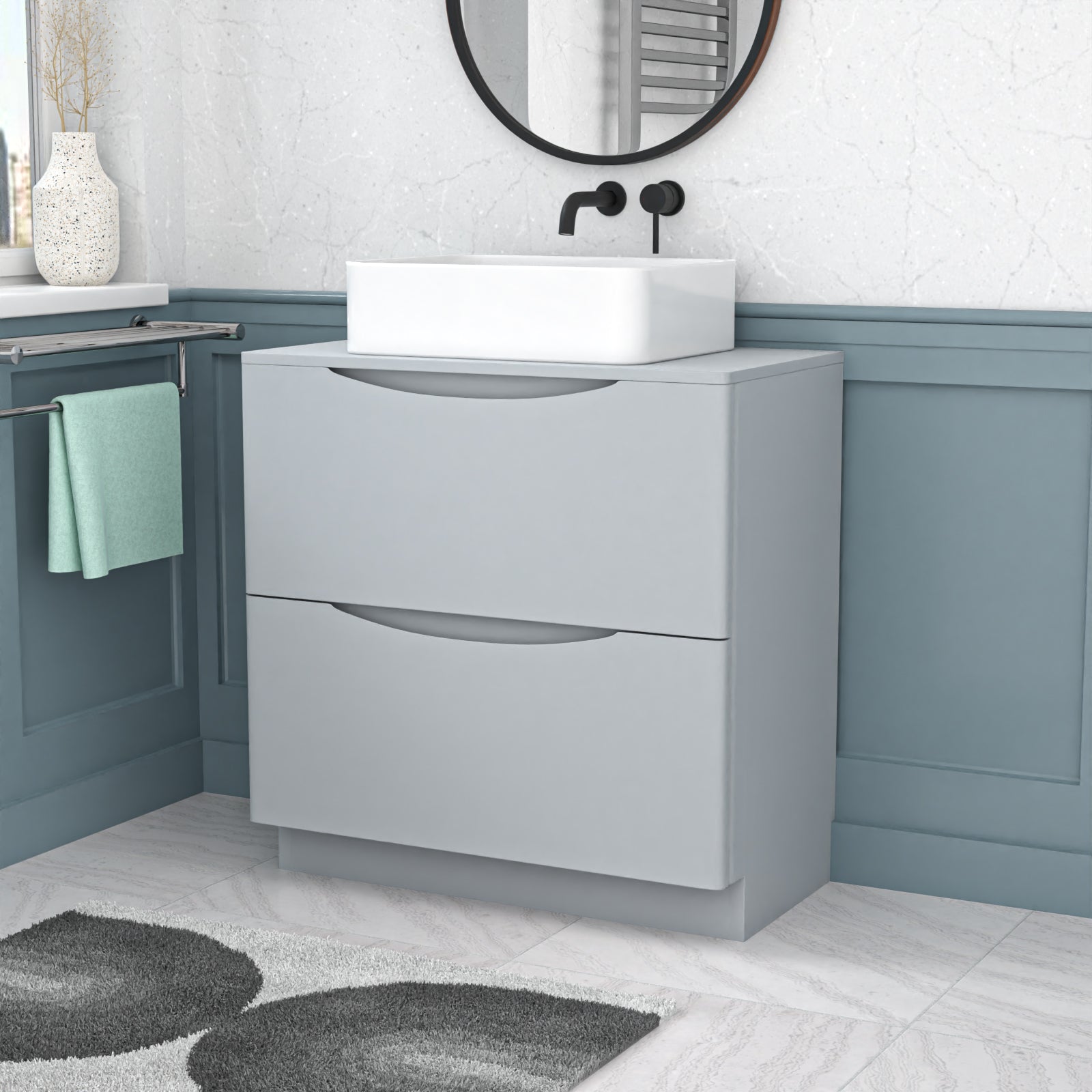 Bathroom vanity with sink and mirror in a modern bathroom setting