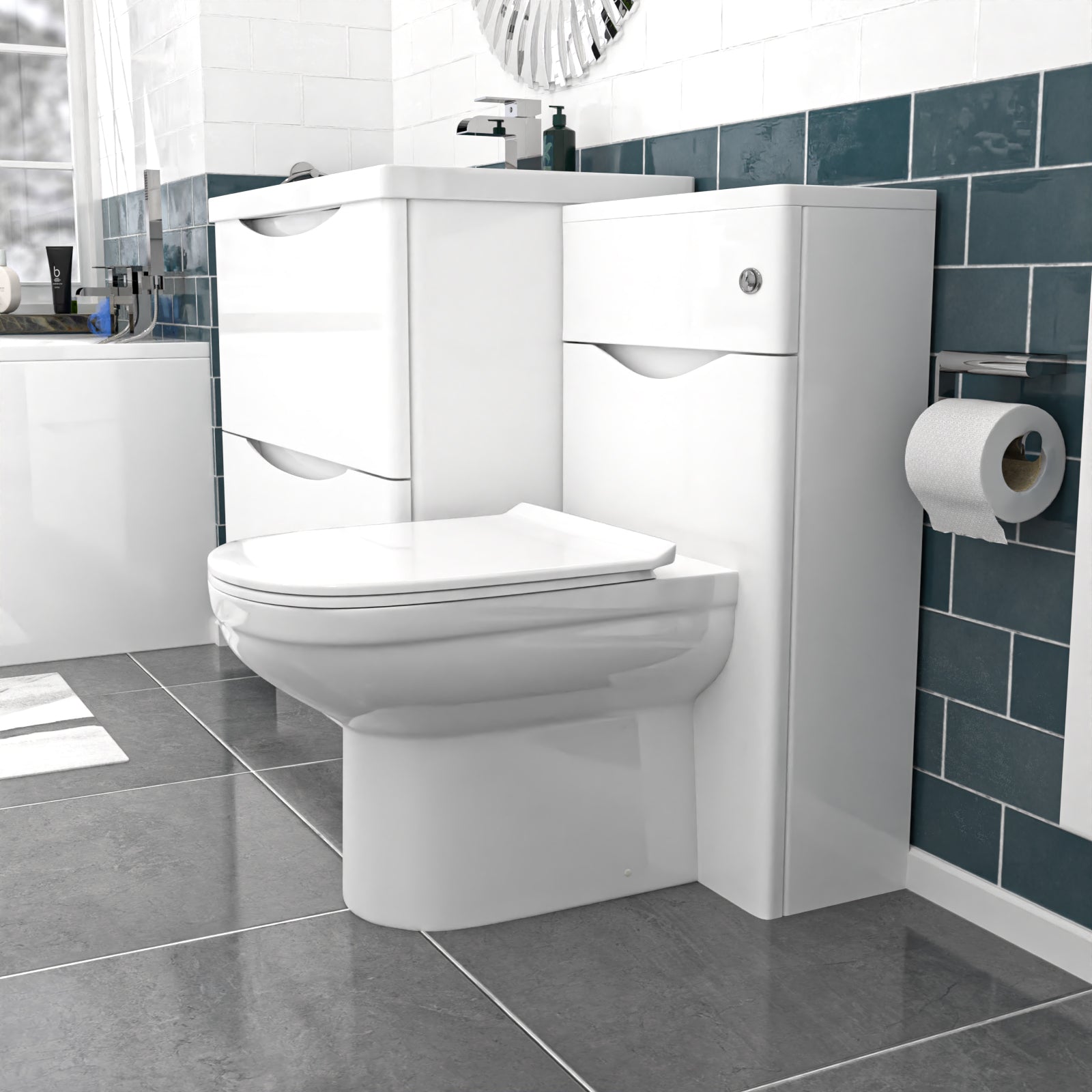 Bathroom with a white toilet and sink unit