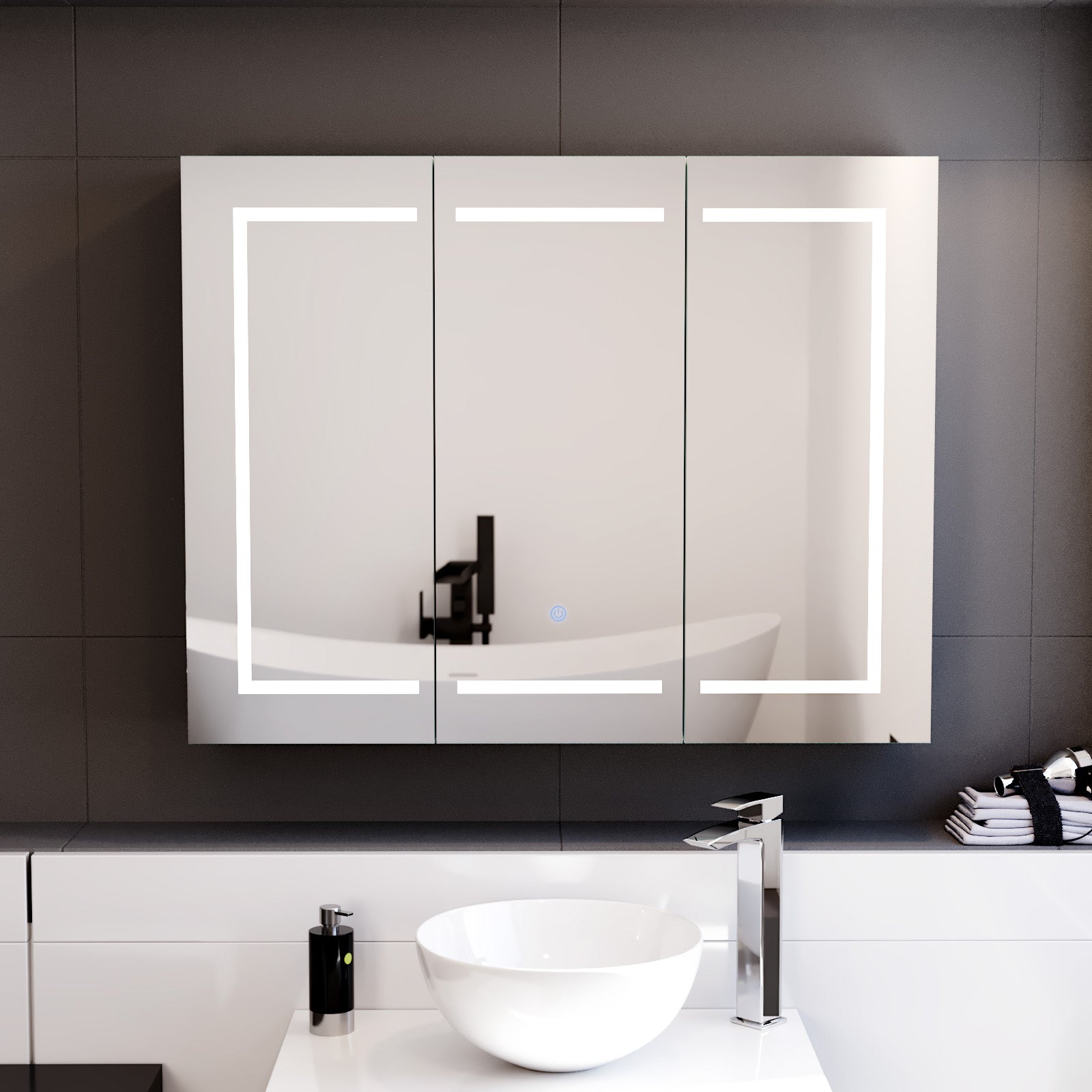 Bathroom with a modern vanity setup featuring a illuminated mirror.