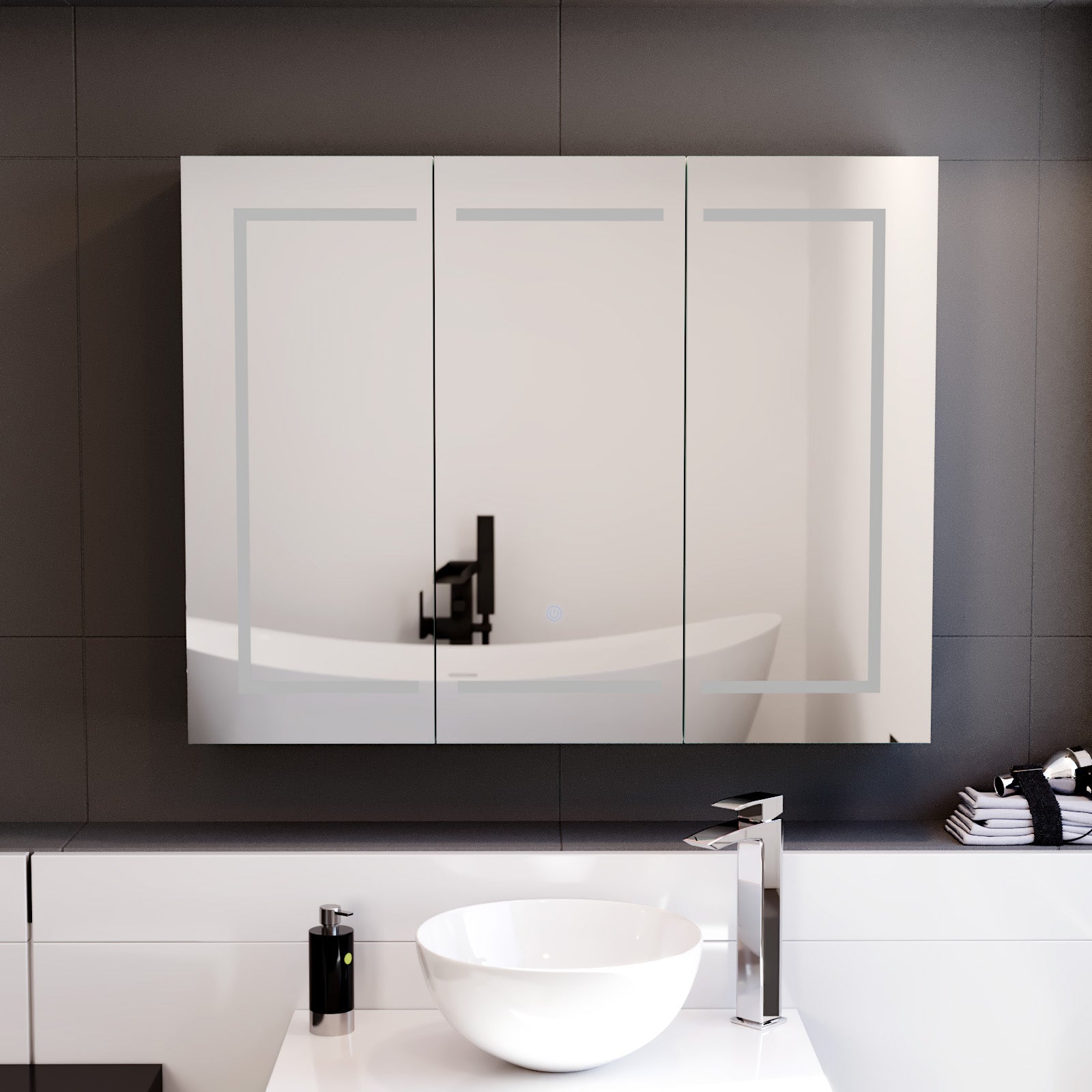 Bathroom with a large mirror above a sink and faucet.