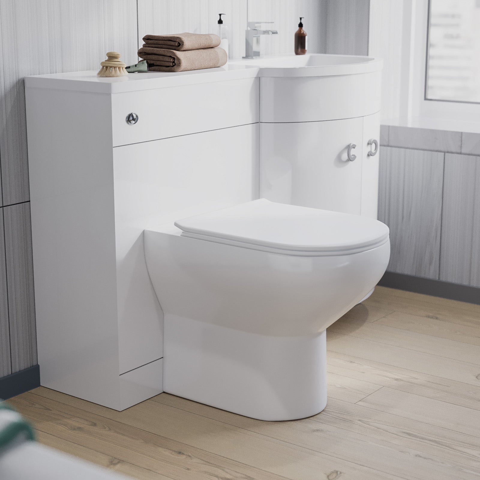 Modern bathroom setup with a toilet and vanity unit.