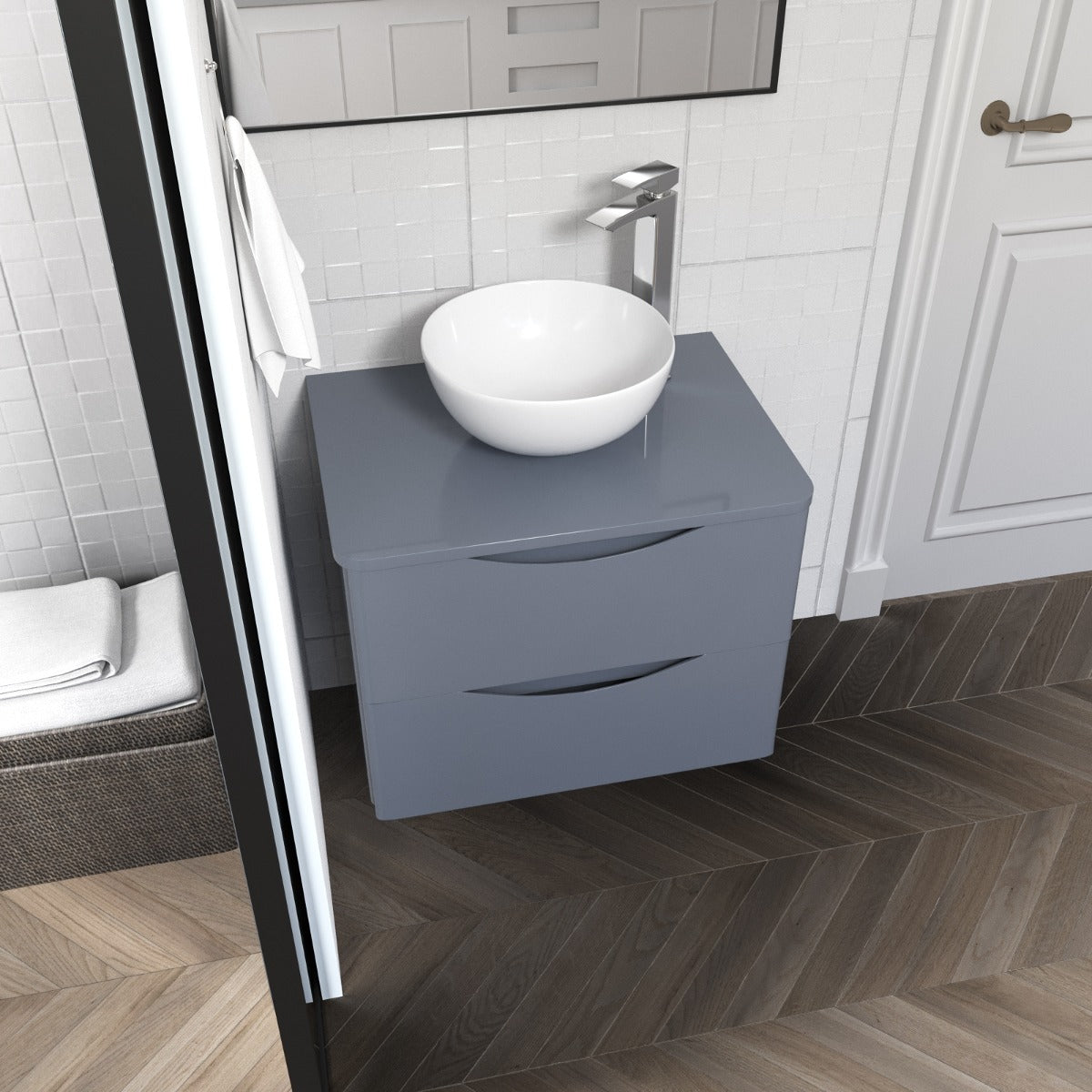 Bathroom vanity with a white sink and gray cabinet.