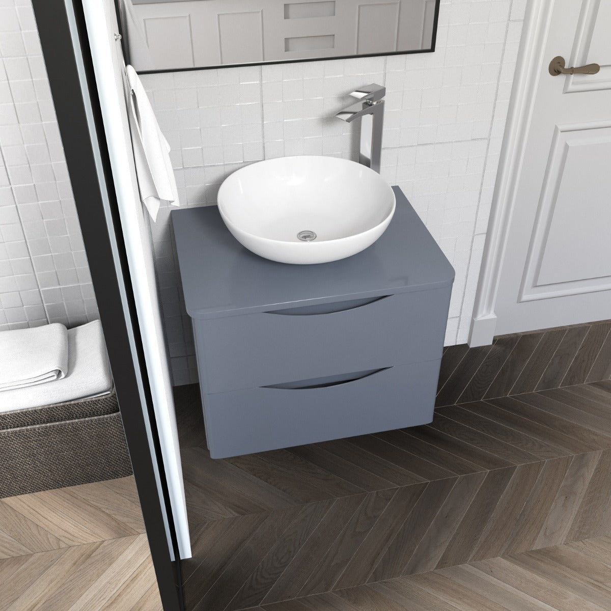 Bathroom vanity with a white sink and gray cabinet.