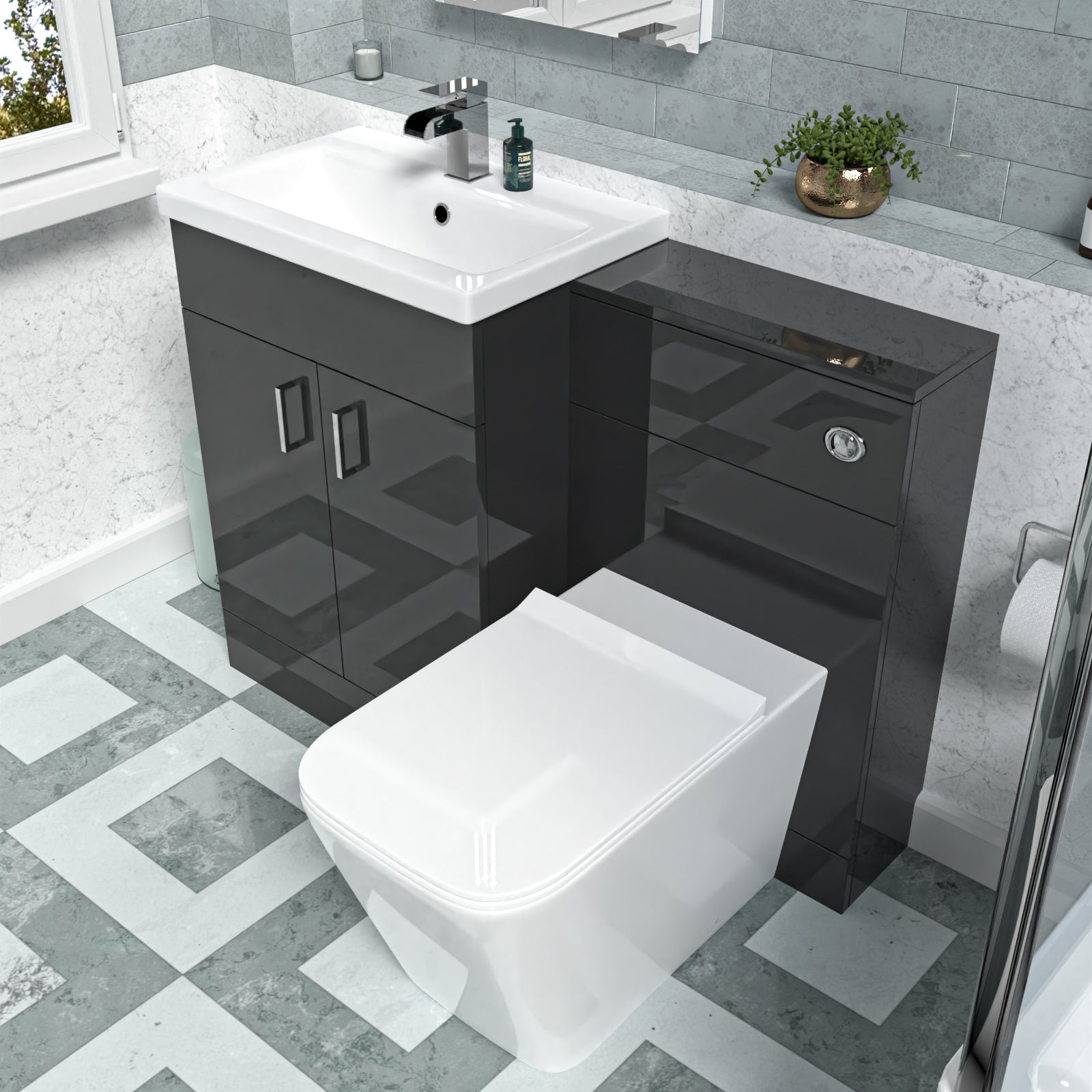 Bathroom setup with black vanity unit, white toilet, and sink.