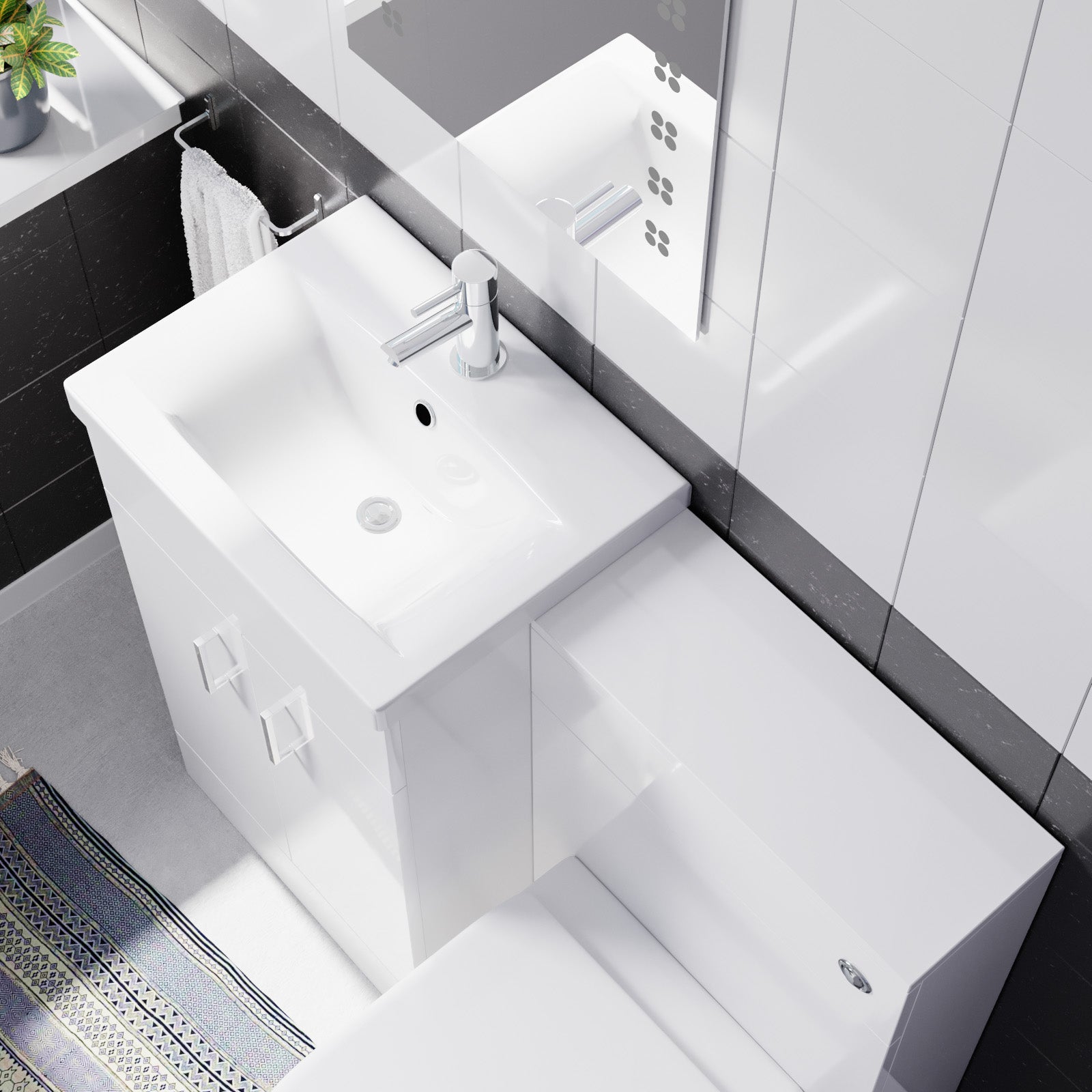White top basin with sleek counter top and a white toilet