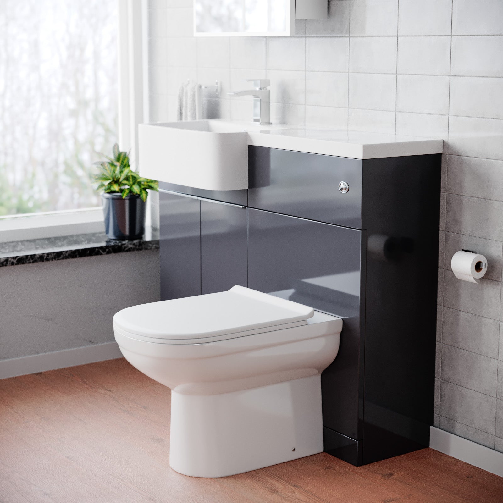 Modern bathroom with a toilet and vanity unit.