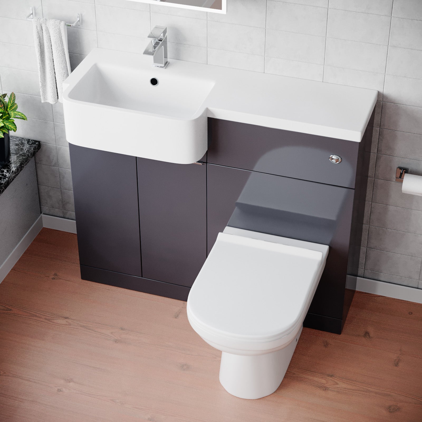 Bathroom setup with a toilet and vanity unit in a modern bathroom.