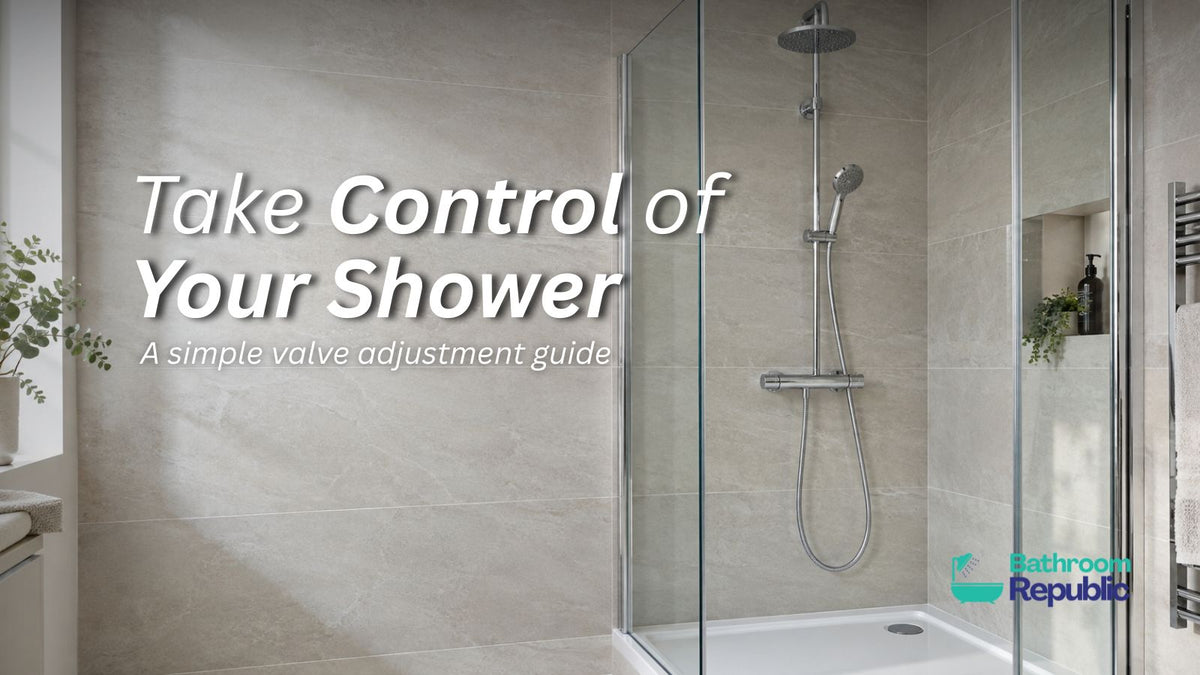 Chrome thermostatic shower valve in a modern glass shower enclosure