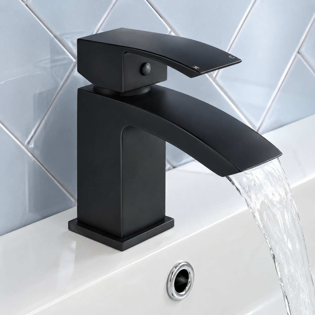 Chrome basin mixer tap on a white basin — Bathroom Republic UK