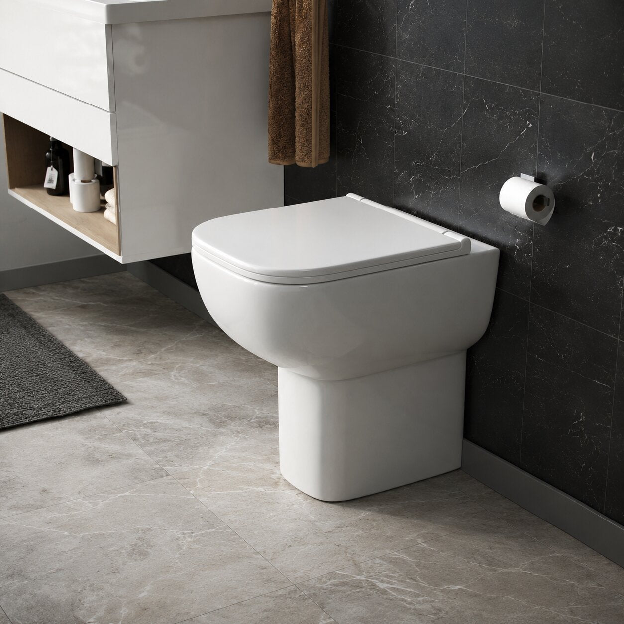 White comfort height toilet with raised seat position of 45cm for easier use — Bathroom Republic UK