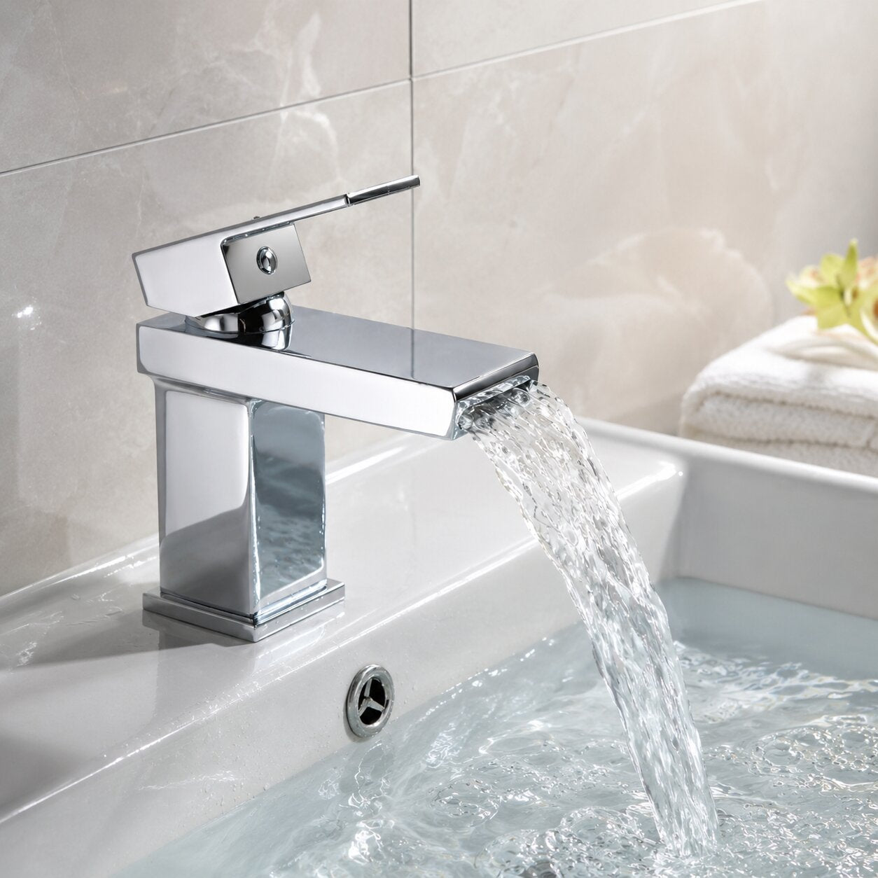 Polished chrome basin mixer tap on white basin — Bathroom Republic UK