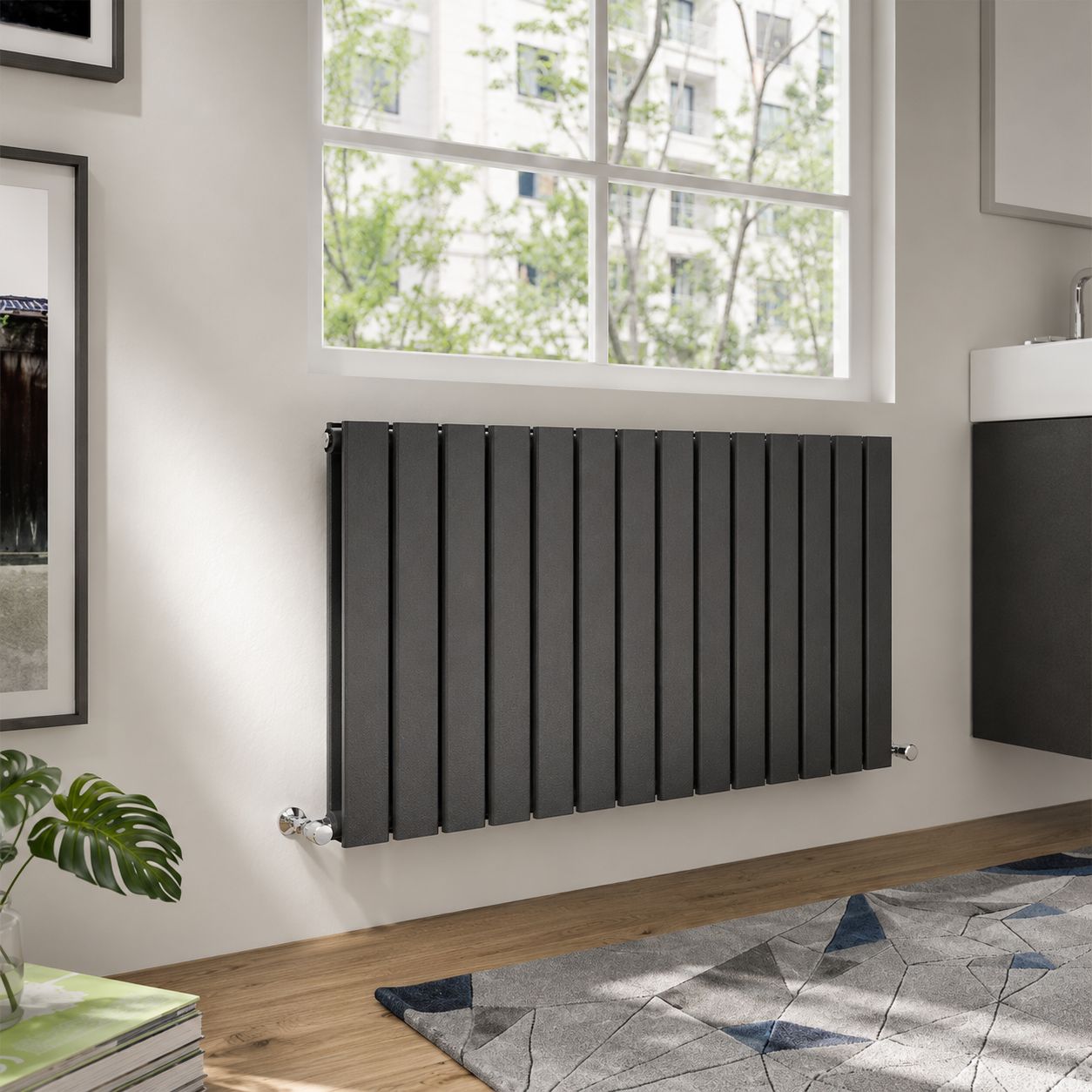 Anthracite horizontal flat panel radiator below window in a modern living room — Bathroom Republic UK