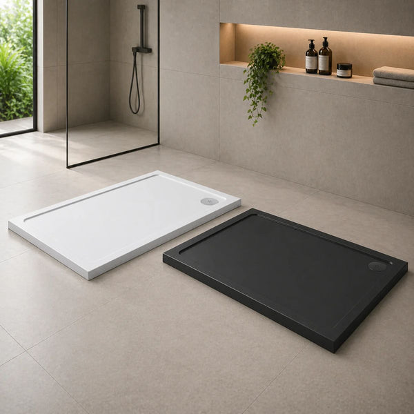 White and slate grey rectangular shower trays side by side — standard-height, asymmetric sizes at Bathroom Republic UK