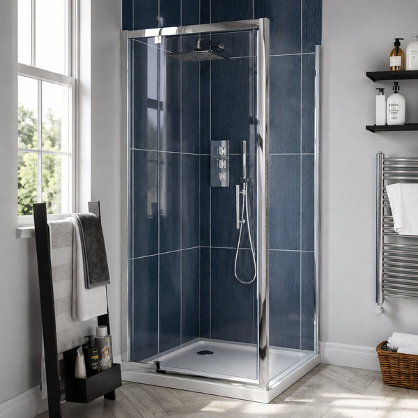 Chrome, matt black and brushed brass shower enclosures displayed side by side — Bathroom Republic UK