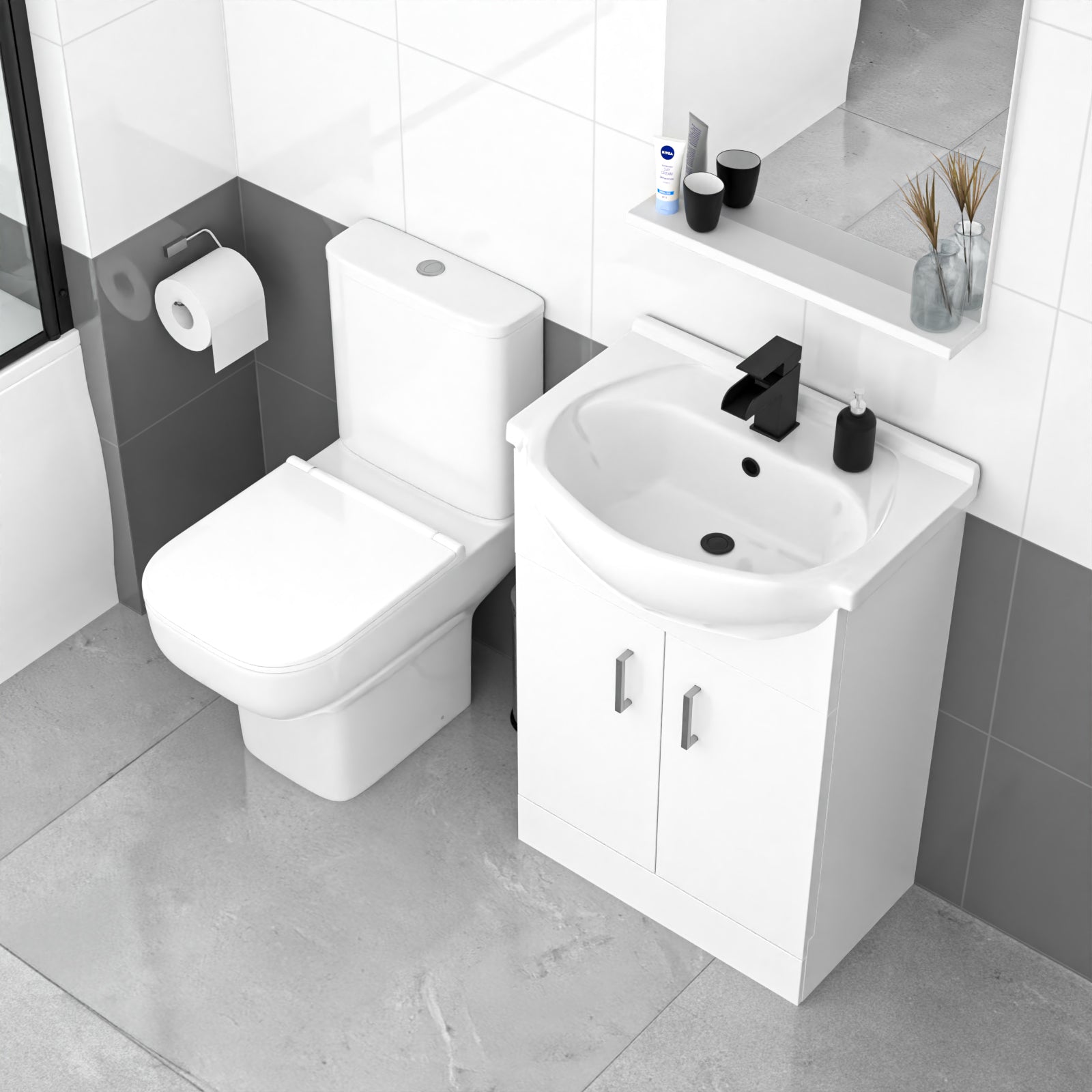 Bathroom setup with a toilet and sink vanity.