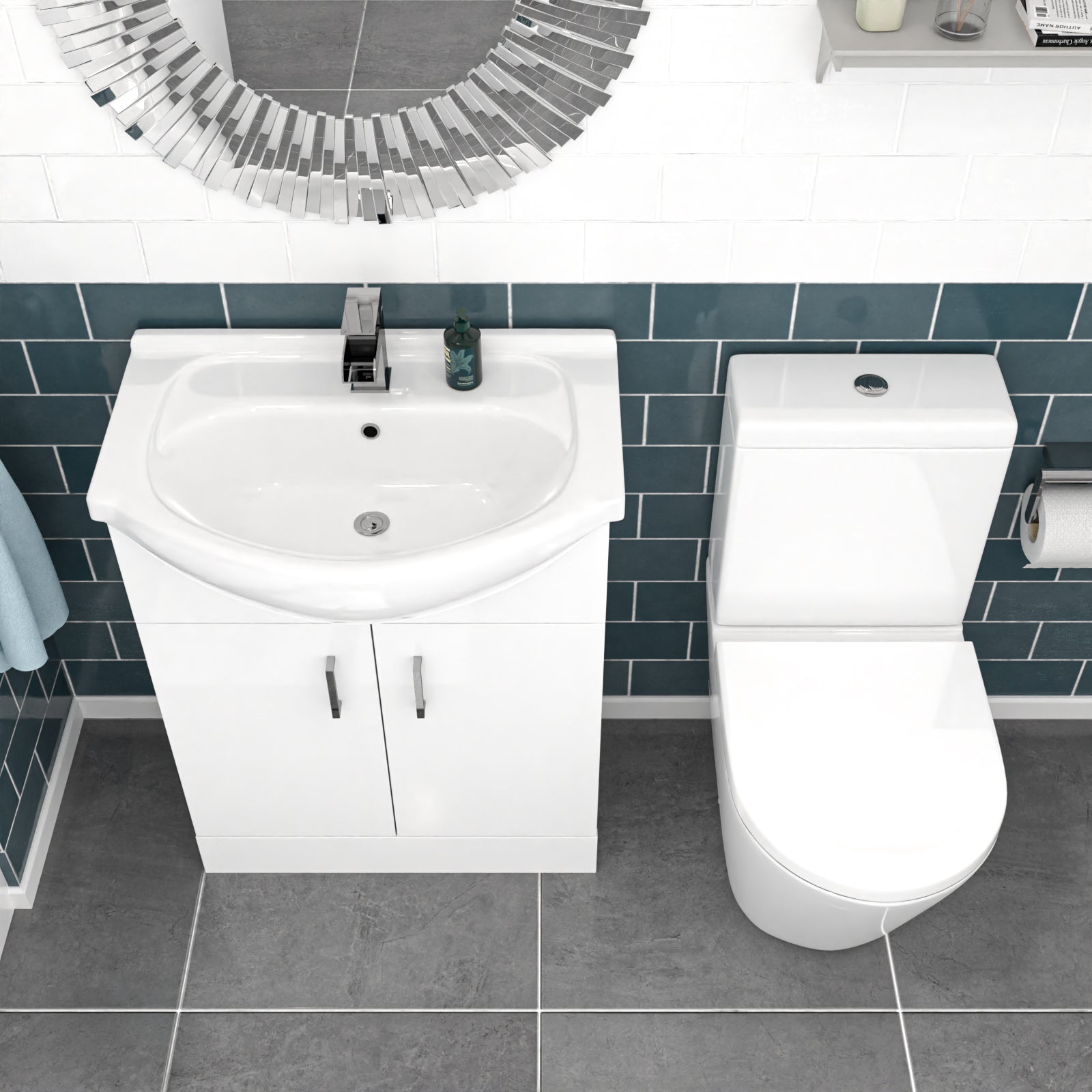 Bathroom setup with white sink and toilet 