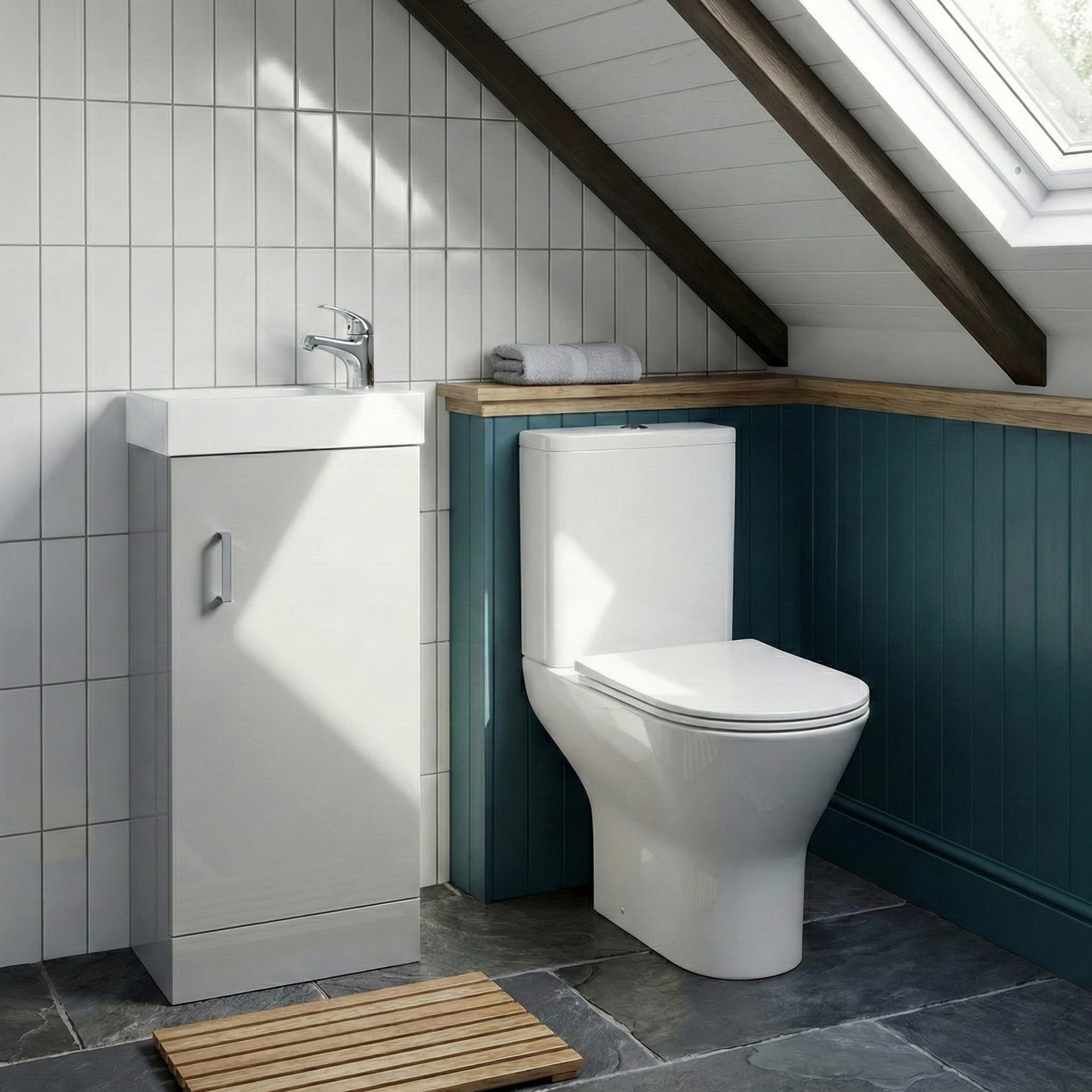 Bathroom with white toilet and sink against a tiled wall.