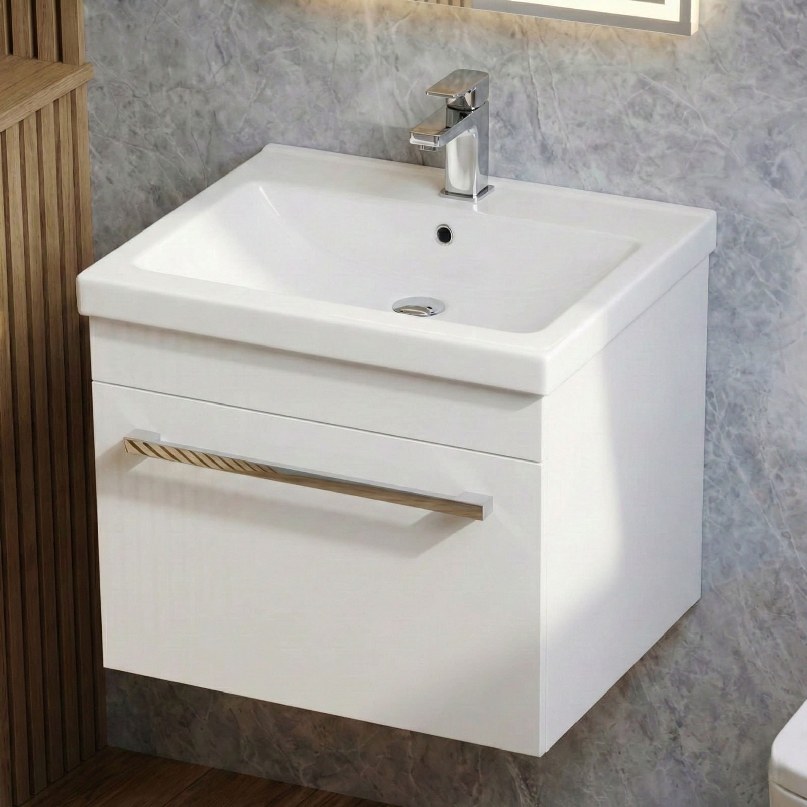 White wall-mounted vanity with a sink and faucet in a bathroom setting.