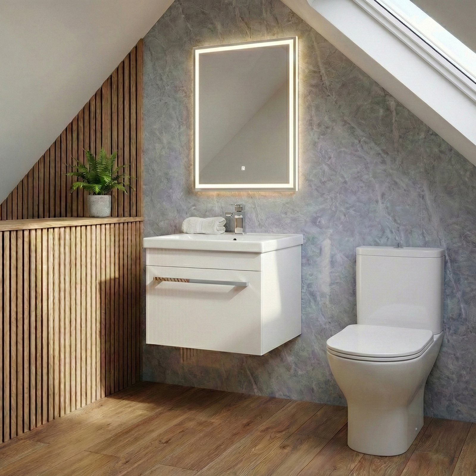Bathroom with a floating vanity unit, mirror, and toilet against a textured wall.