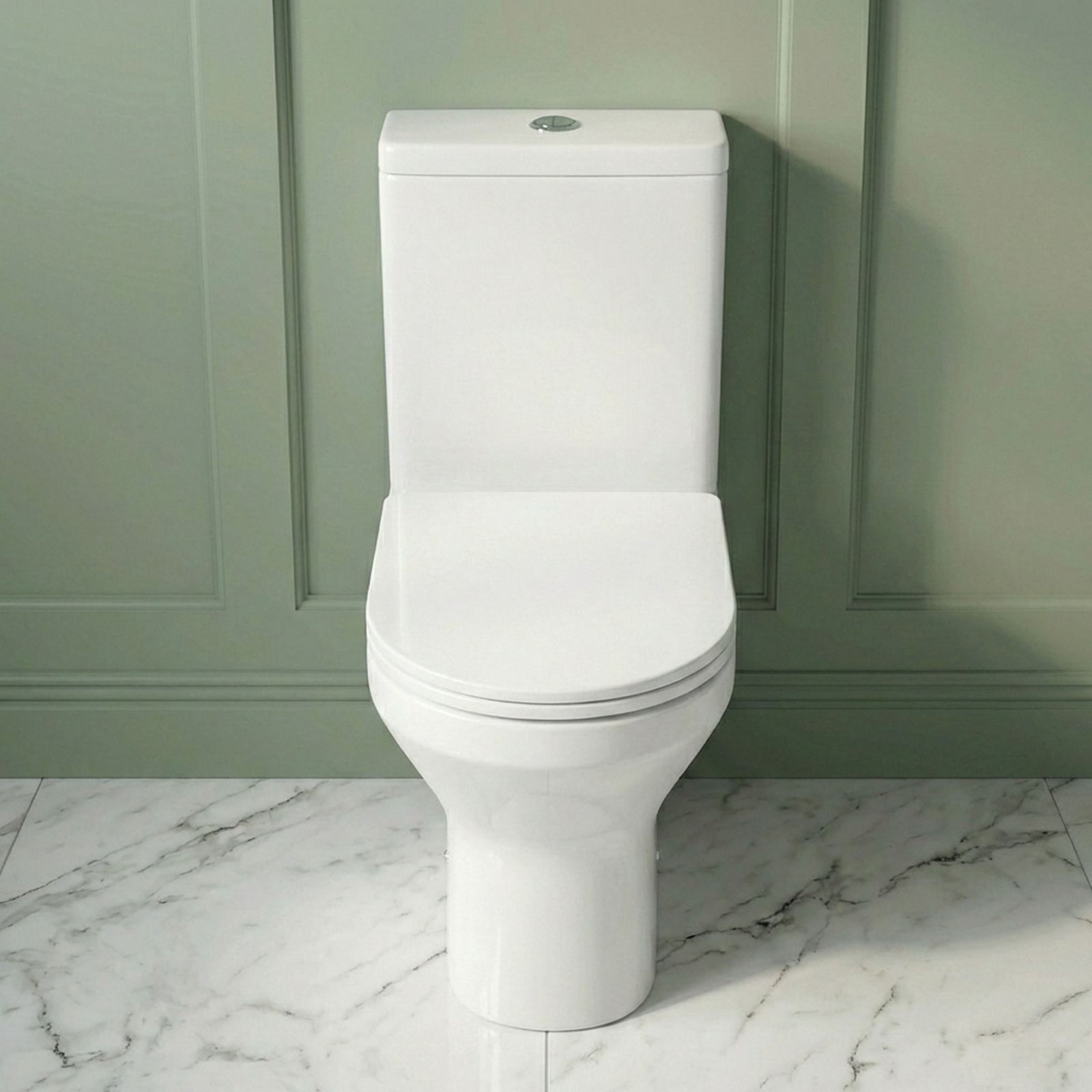 White toilet against a green paneled wall with marble floor