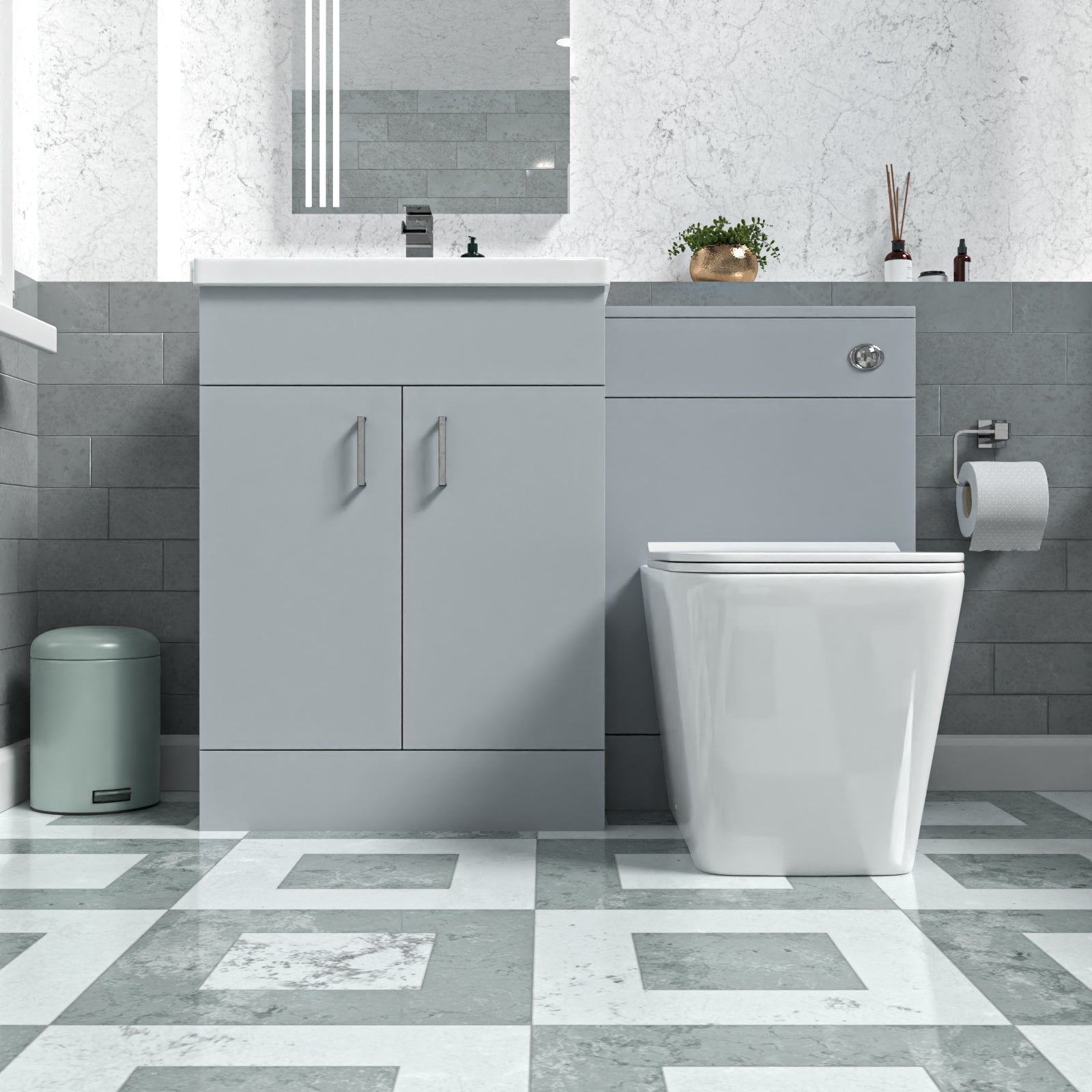 Silver accent setup with trapizium toilet and white basin and metal tap