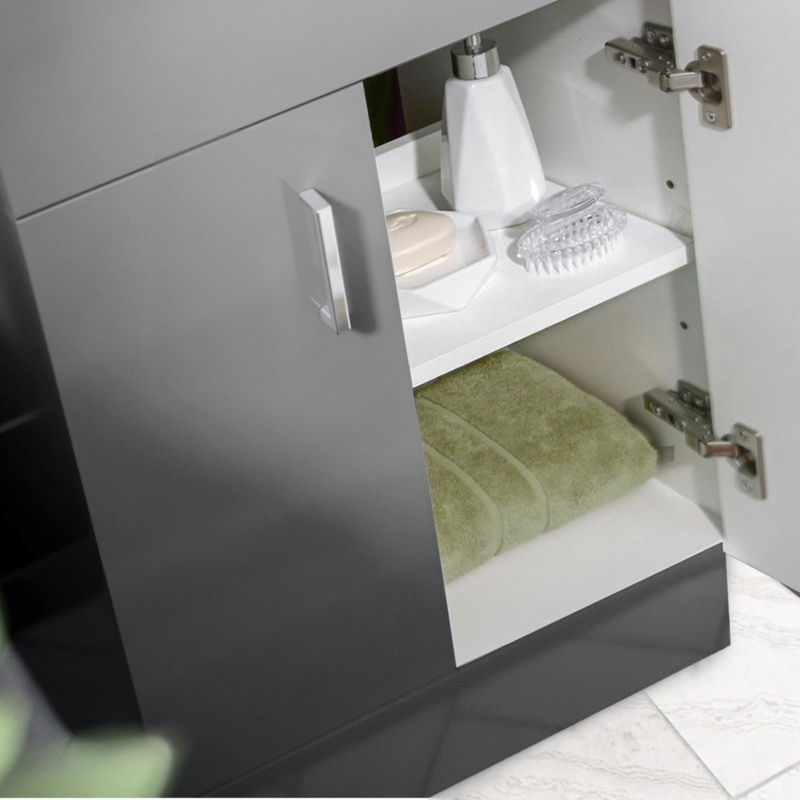 Gray bathroom cabinet with open door revealing a green towel and toiletries.