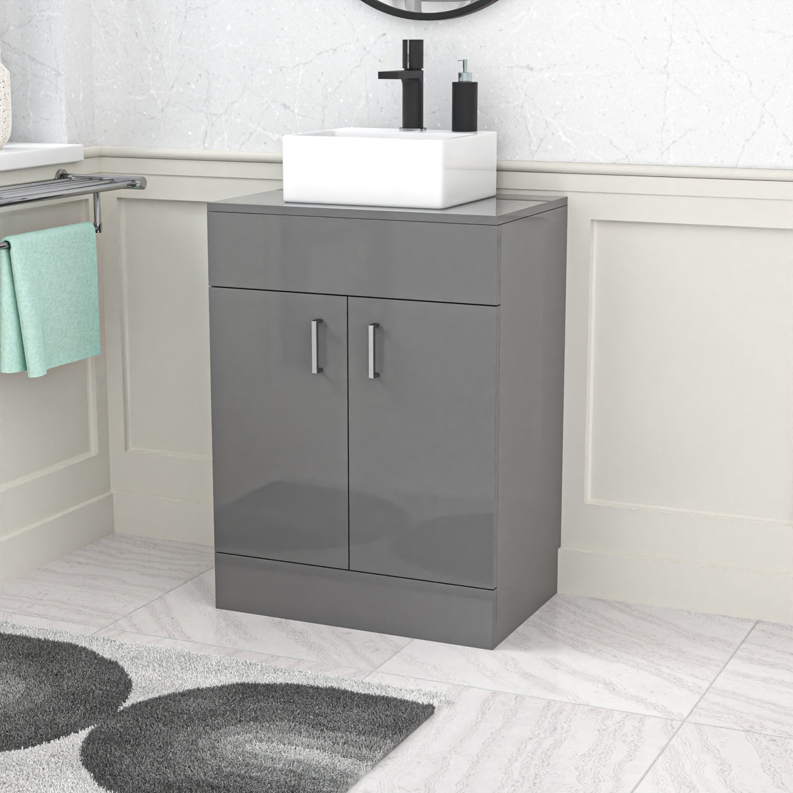 Gray vanity unit with white basin in a bathroom setting