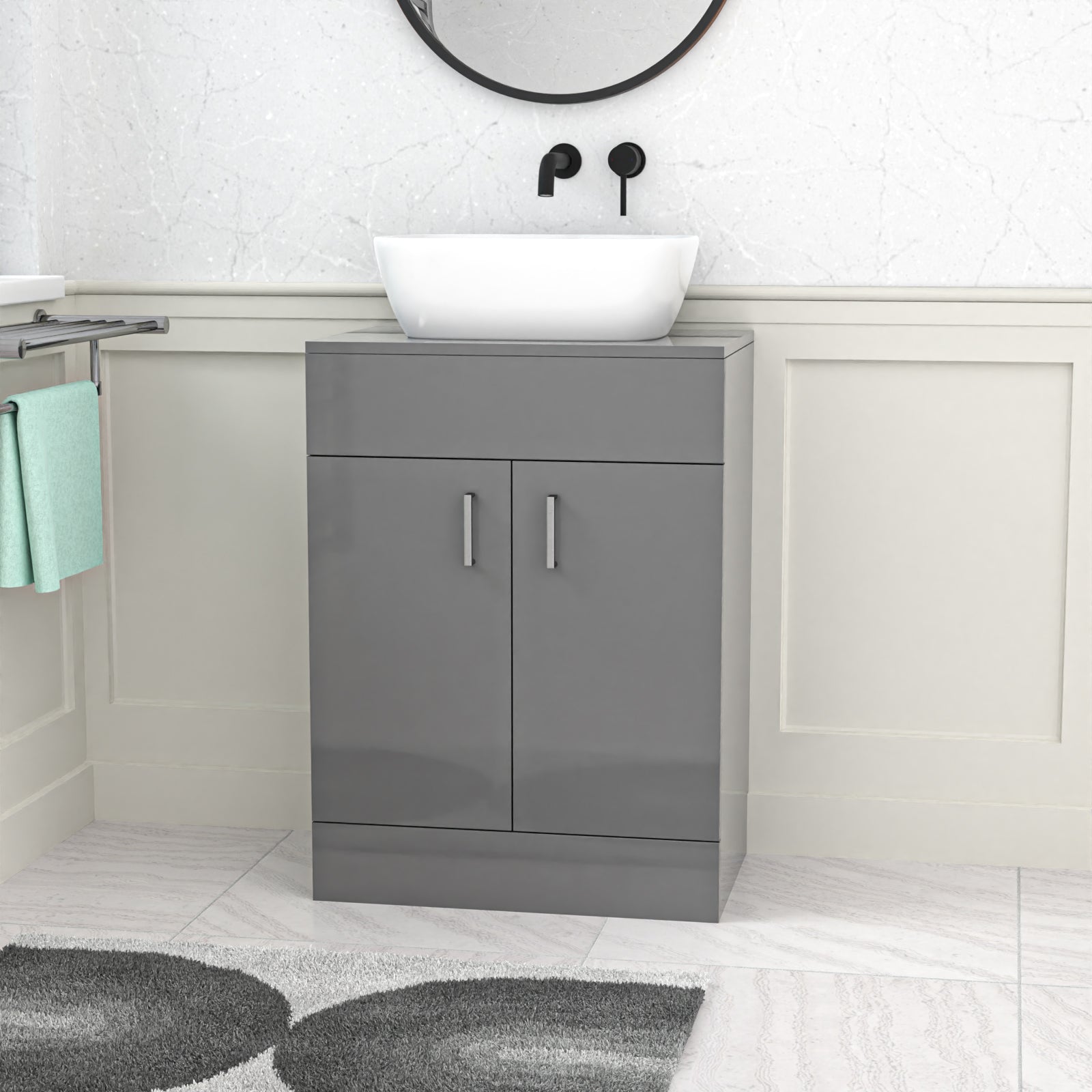Gray vanity unit with a white basin in a bathroom setting