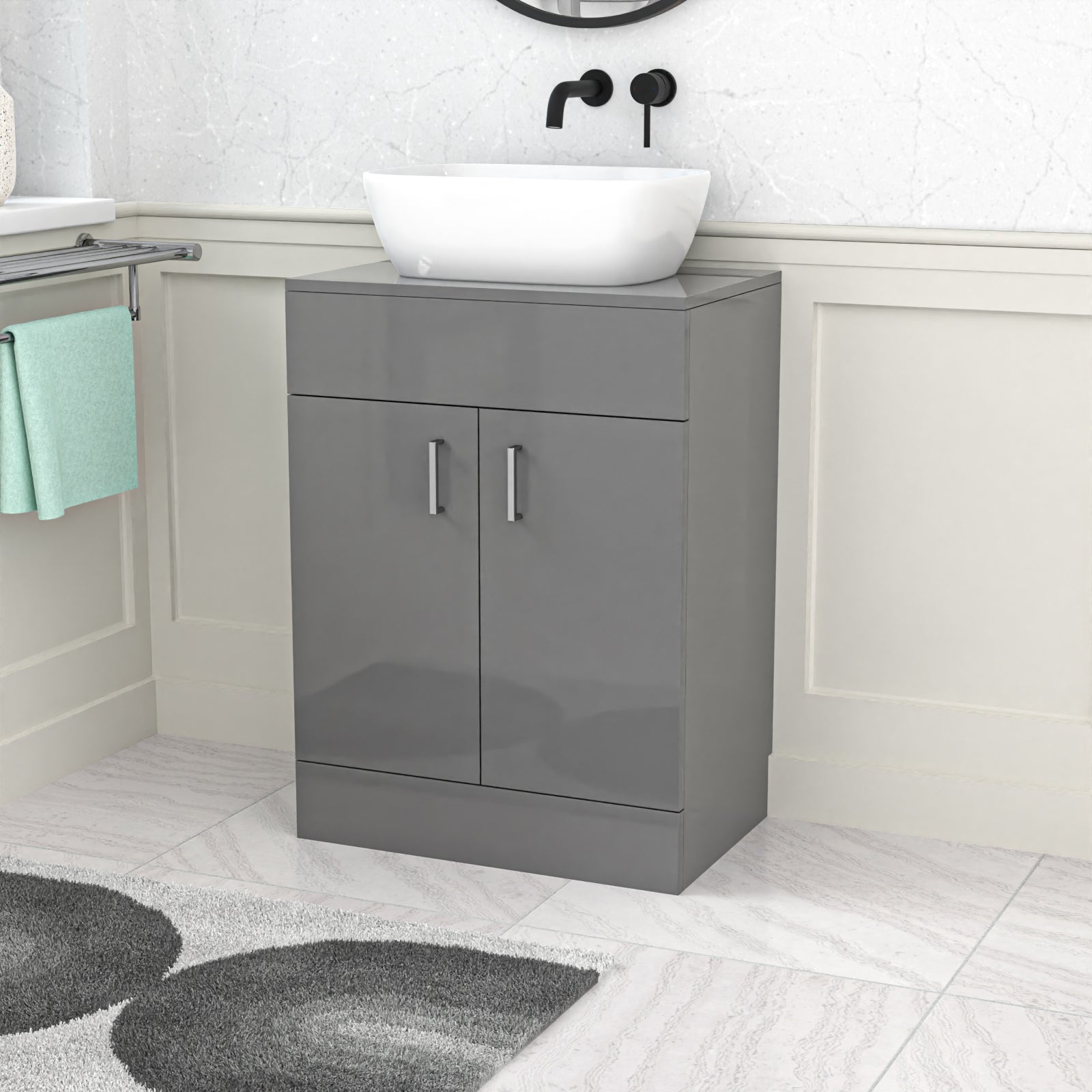 Gray vanity unit with white basin in a bathroom setting