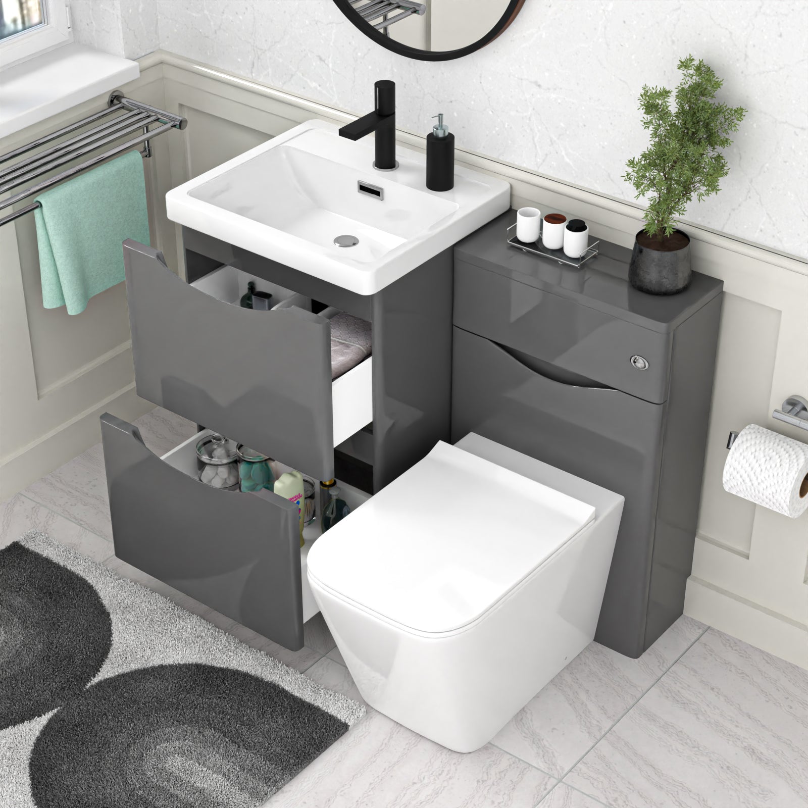 Bathroom setup with gray vanity unit, white sink, and toilet.