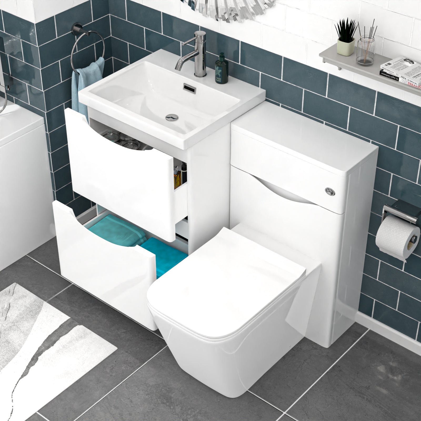 Bathroom setup with white vanity unit, toilet, and sink against a blue tiled wall.