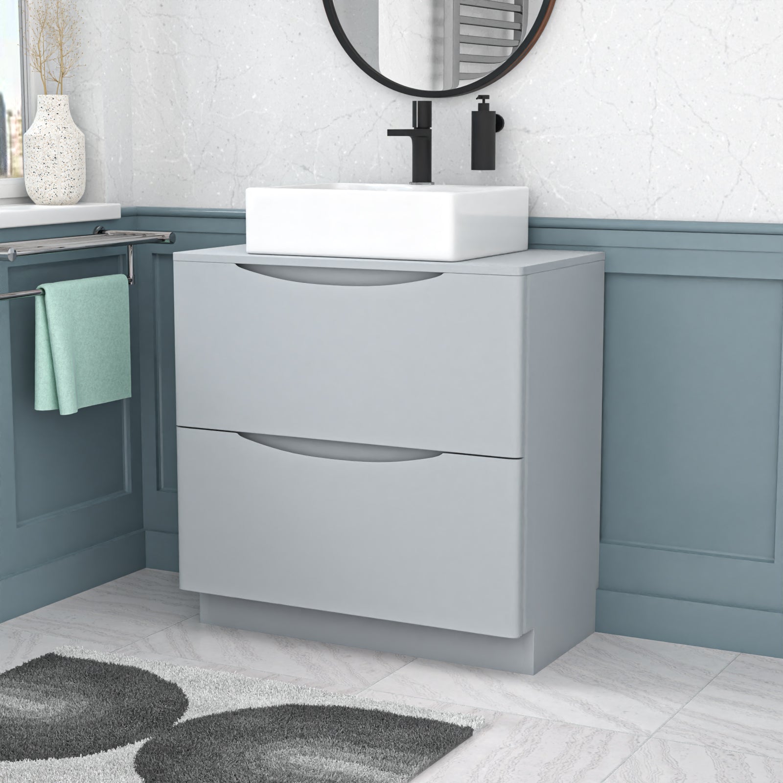 Bathroom vanity with sink and mirror in a bathroom setting