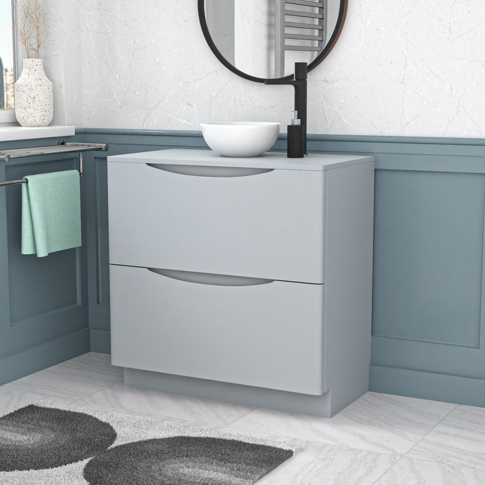 Bathroom vanity with sink and mirror in a modern bathroom setting