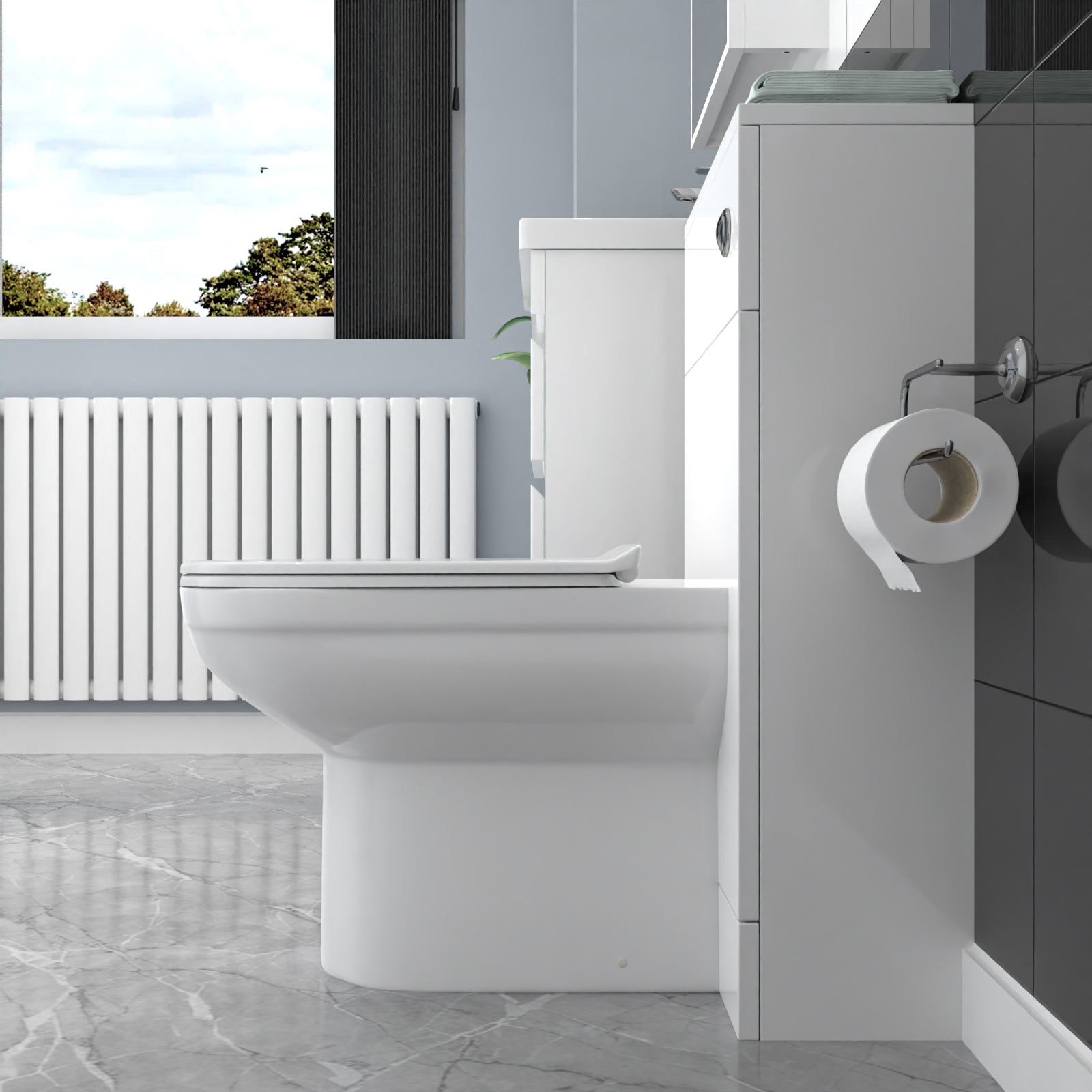 Modern bathroom with a toilet and toilet paper holder.