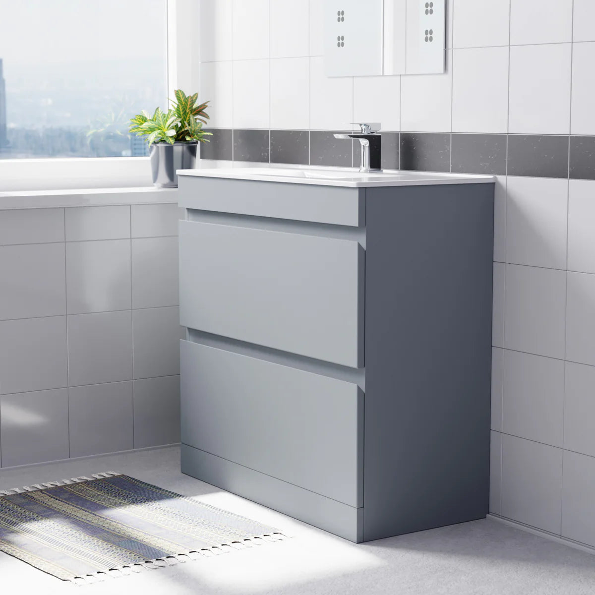 Gray vanity unit with white countertop in a bathroom setting