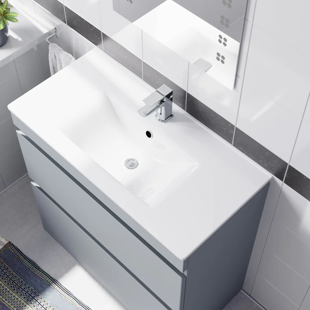Bathroom vanity with white countertop and gray cabinet