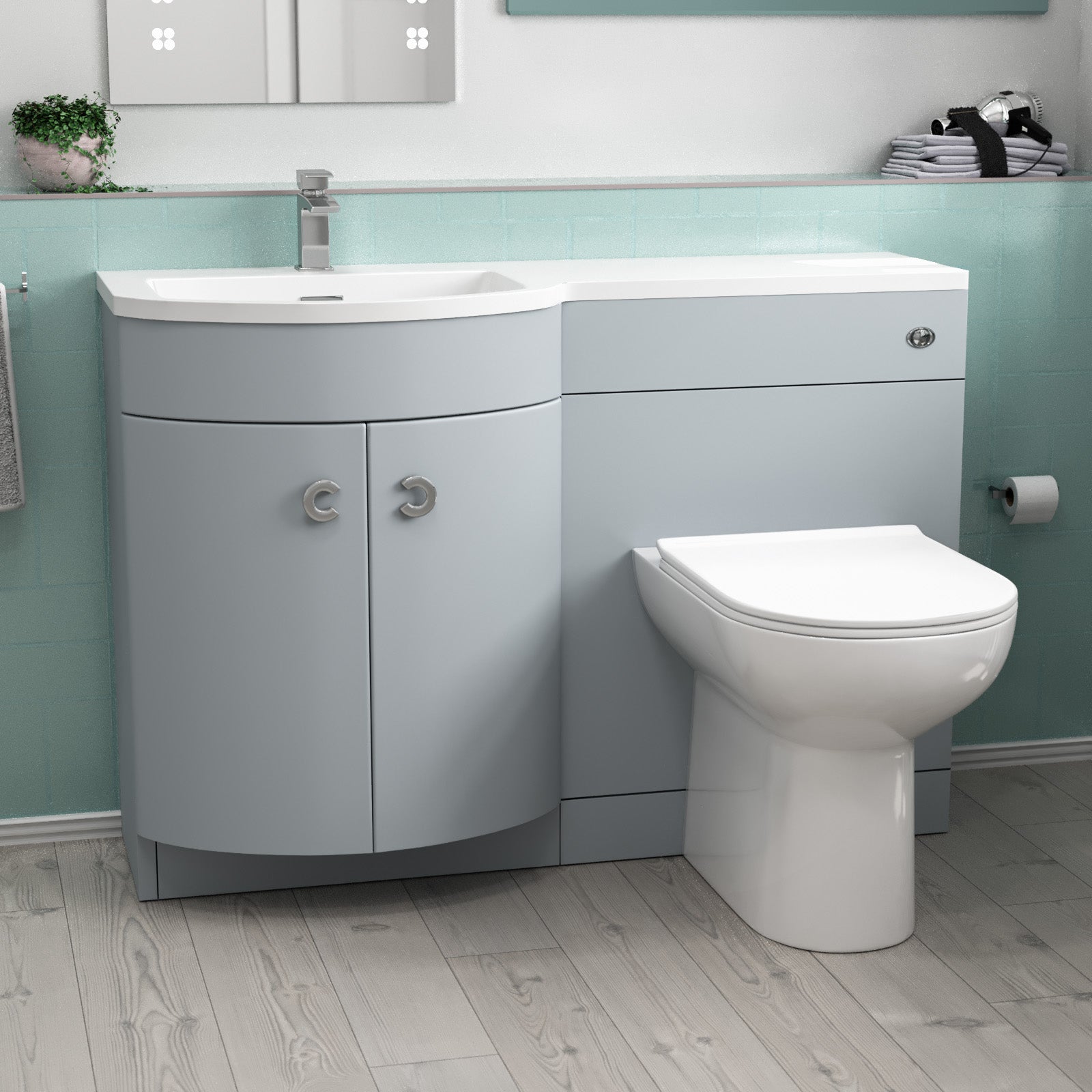 Bathroom setup with a gray vanity unit and white toilet 