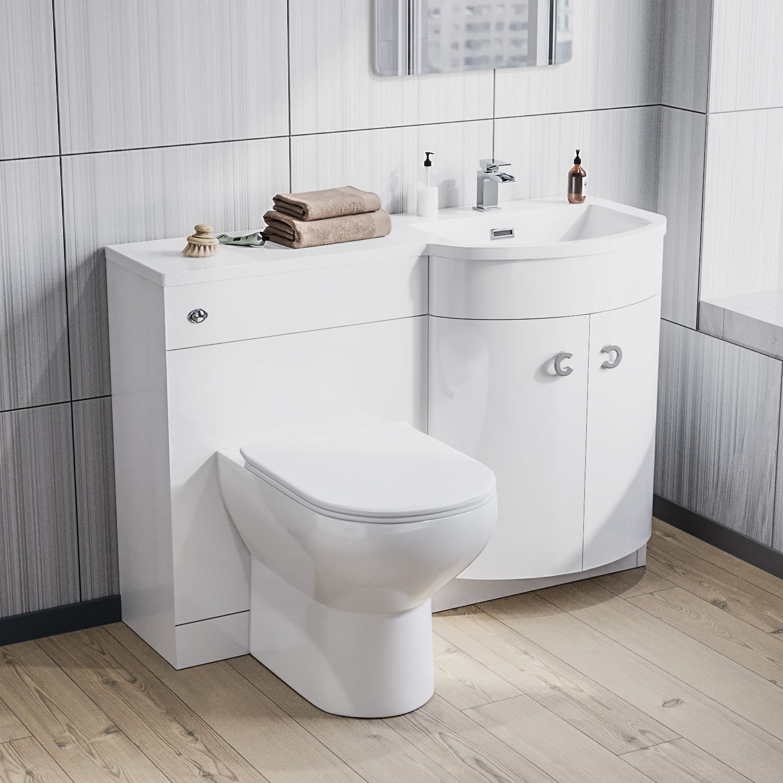 Bathroom setup with white toilet and vanity unit