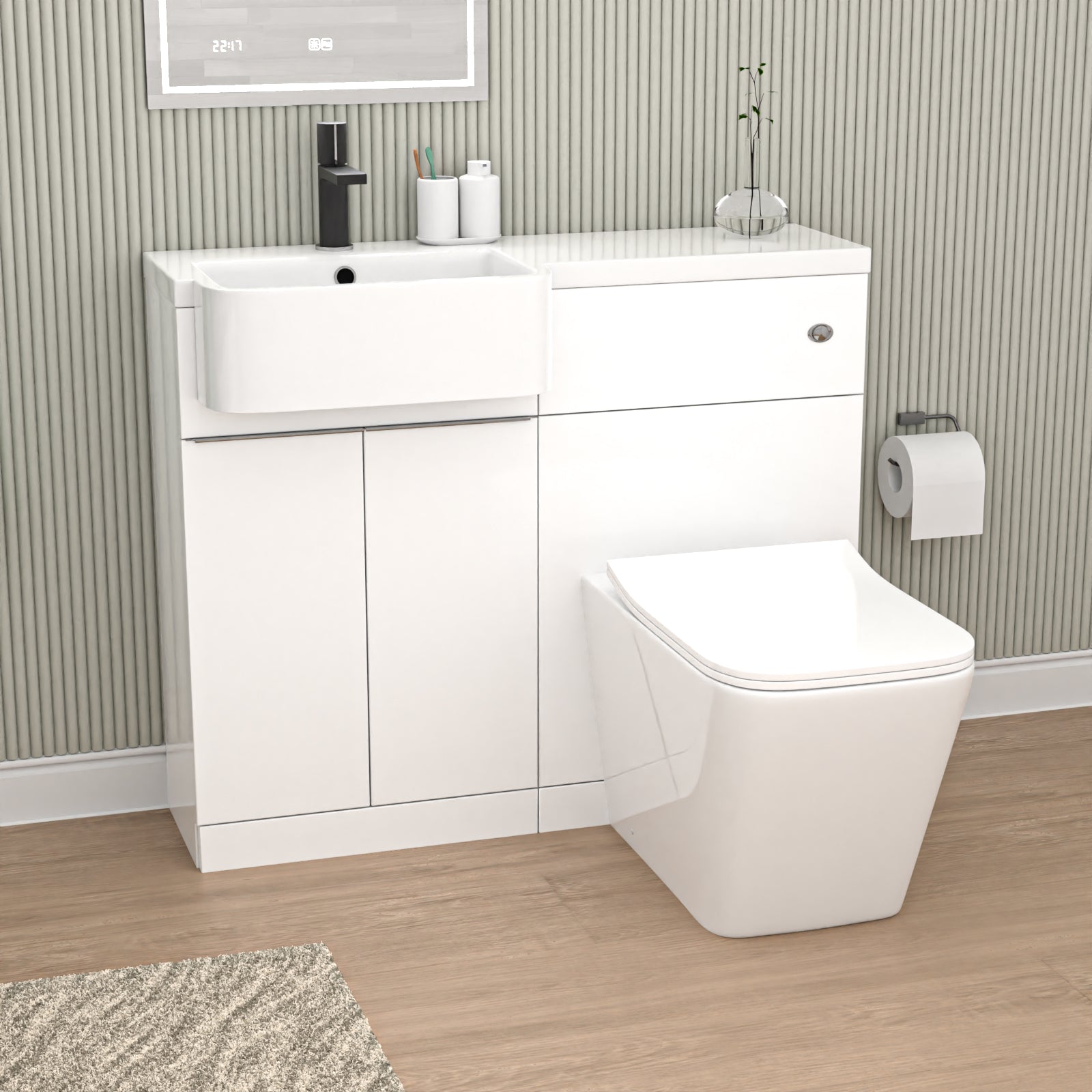 Bathroom setup with white vanity unit, toilet, and sink against a striped wall.