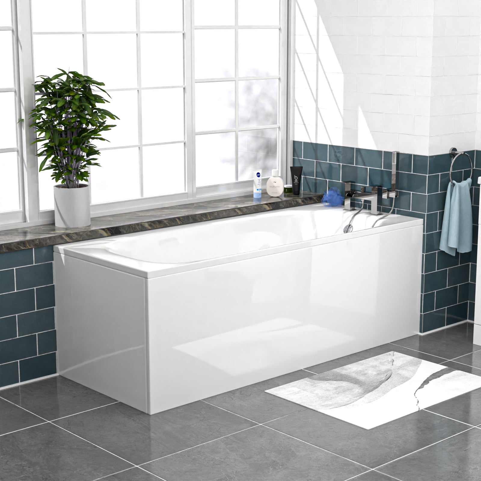 Modern bathroom with a white bathtub, blue tiles, and a plant.