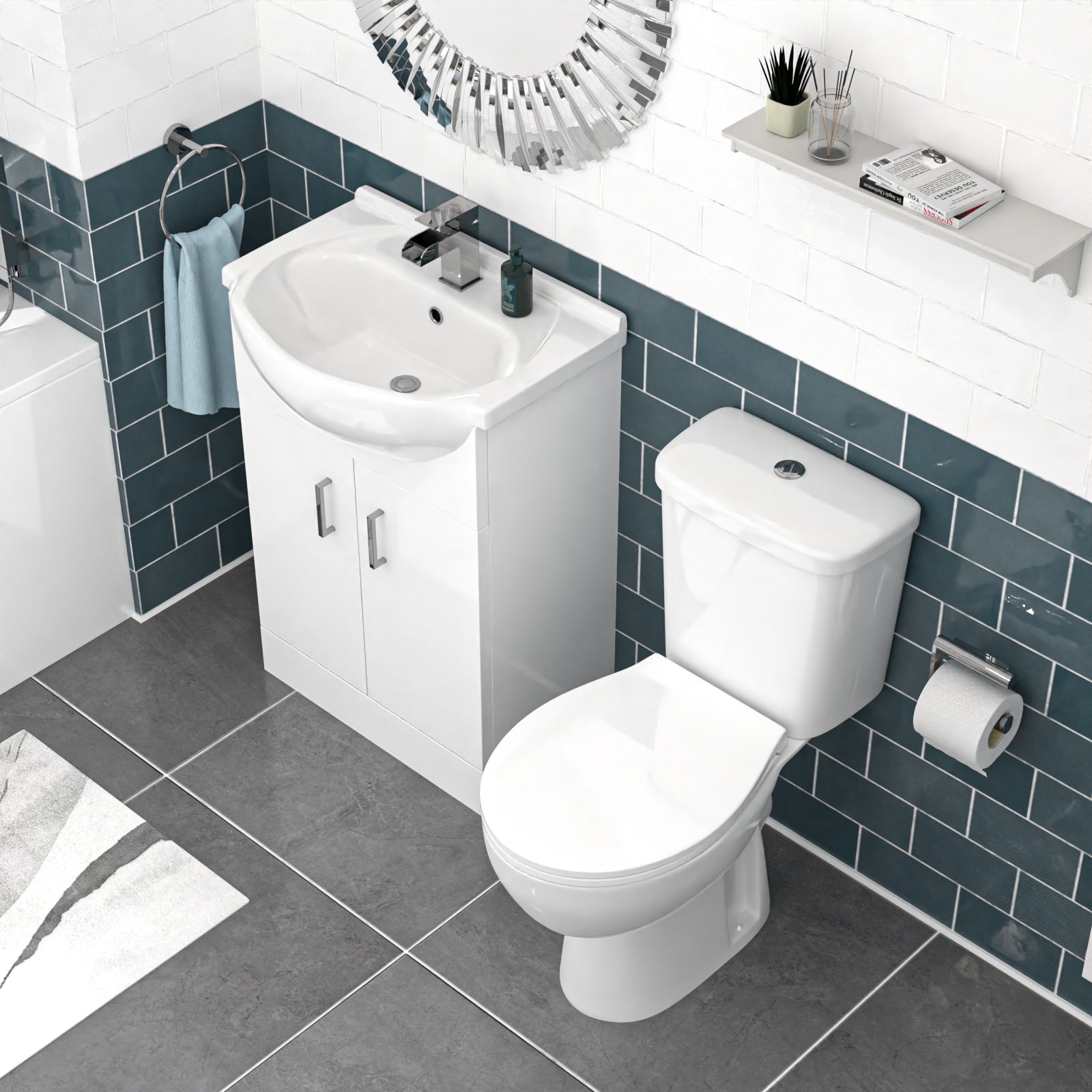 Bathroom setup with a white toilet and sink unit against a blue tiled wall.